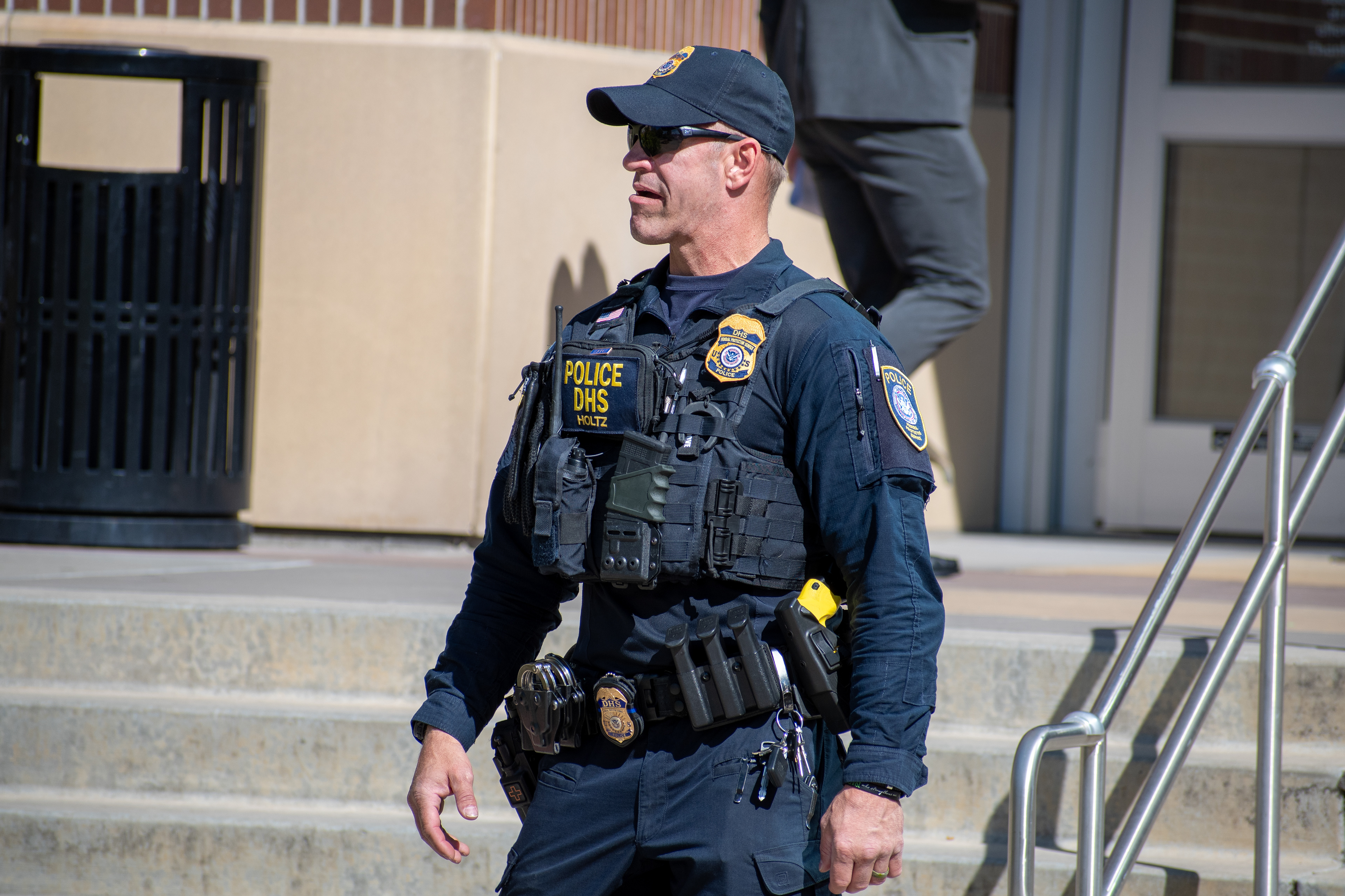 September 15, 2025 – Provo, Utah, United States: A Homeland Security police officer stands outside the Utah Valley Convention Center during a Department of Homeland Security career expo focused on recruiting law enforcement and security personnel. Photograph by Charles‑McClintock Wilson / ZUMA Press Wire