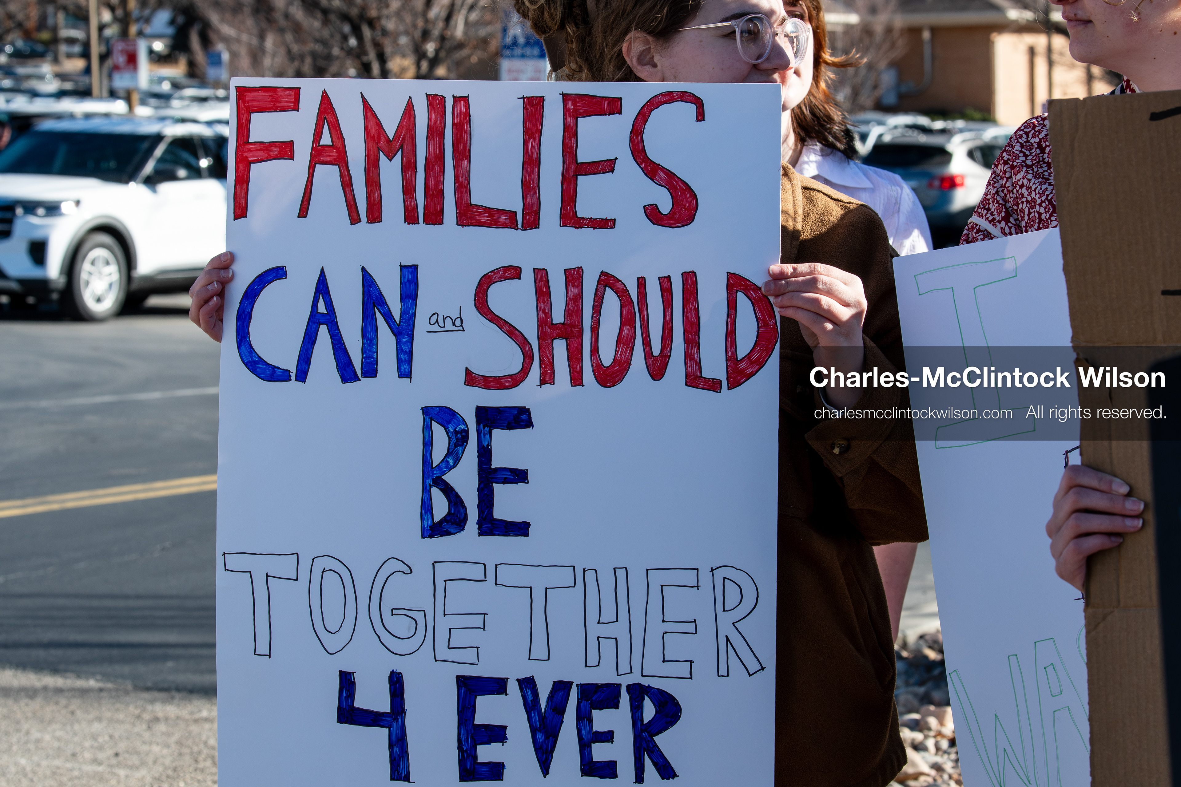 February 5, 2026, Provo, Utah, USA: A demonstrator holds a sign during a gathering near Brigham Young University in Provo where students and community members protested the presence of US Customs and Border Protection recruiters at a career fair held on the BYU campus. (Credit Image: © Charles McClintock Wilson/ZUMA Press Wire)