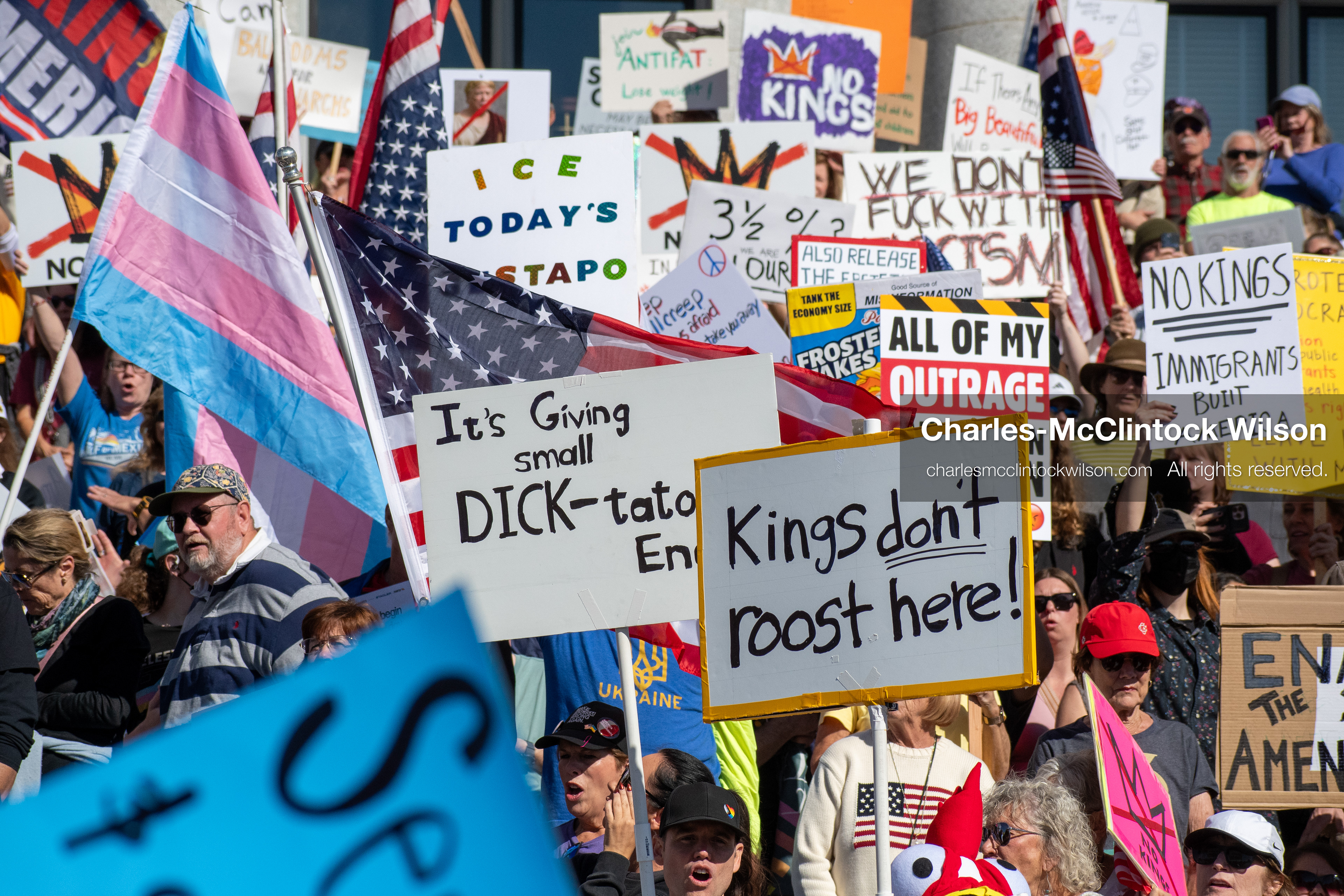 October 18, 2025, Salt Lake City, Utah, USA: Demonstrators participate in a "No Kings" protest held at the Utah State Capitol. Participants hold signs and flags during the public gathering.
