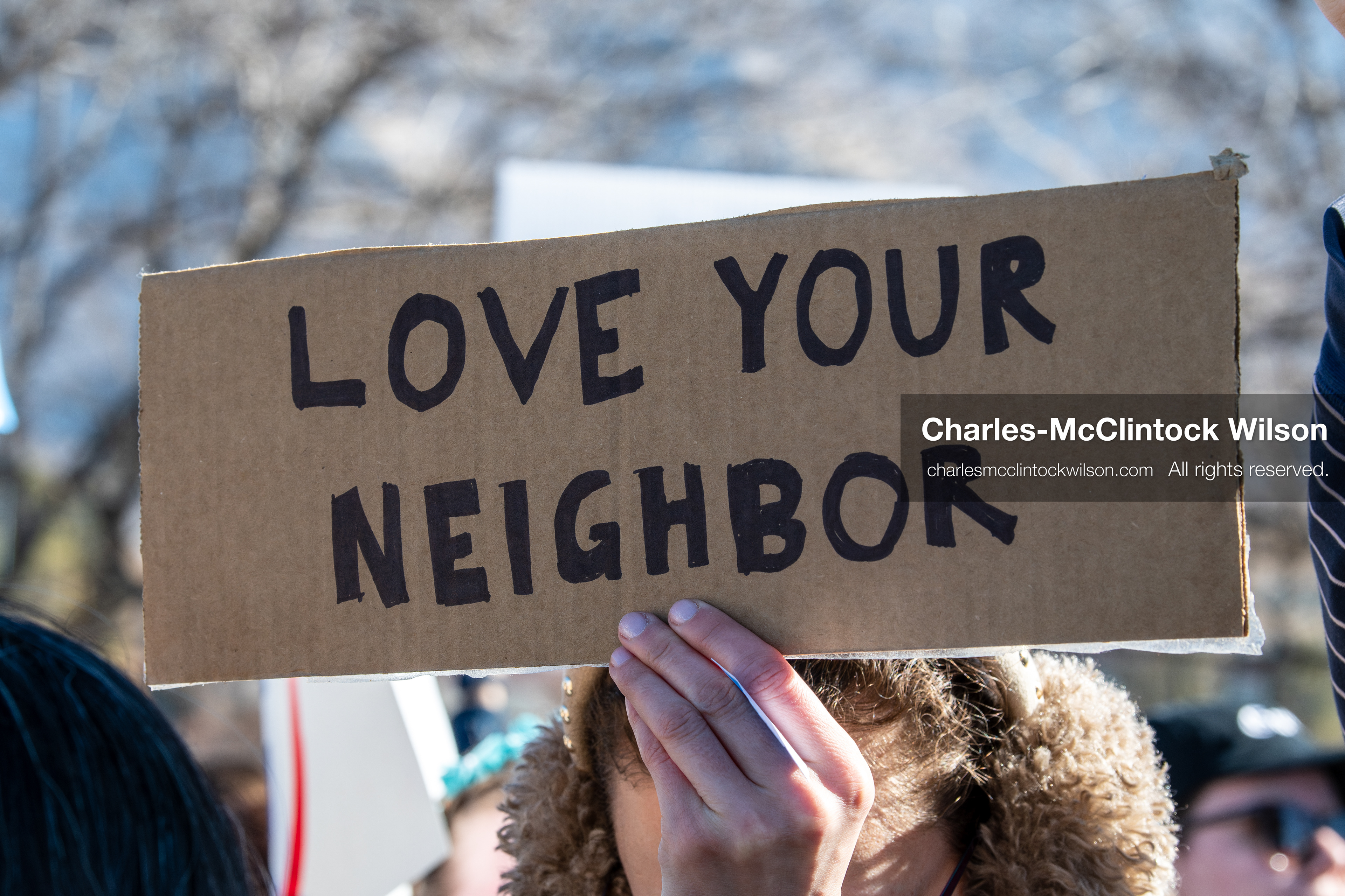 February 5, 2026, Provo, Utah, USA: A demonstrator holds a sign during a gathering near Brigham Young University in Provo where students and community members protested the presence of US Customs and Border Protection recruiters at a career fair held on the BYU campus. (Credit Image: © Charles McClintock Wilson/ZUMA Press Wire)