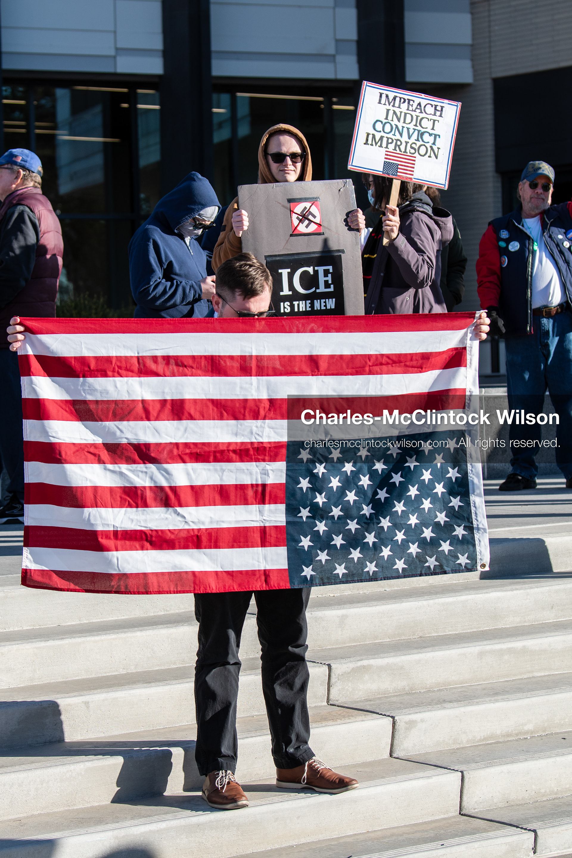 January 20, 2026, Provo, Utah, USA: A protester displays an upside down American flag and a sign opposing ICE during the Free America Walkout outside Provo City Hall in Provo Utah on January 20 2026. The nationwide protest called for justice immigration reform and an end to detention practices. (Credit Image: © Charles-McClintock Wilson/ZUMA Press Wire)