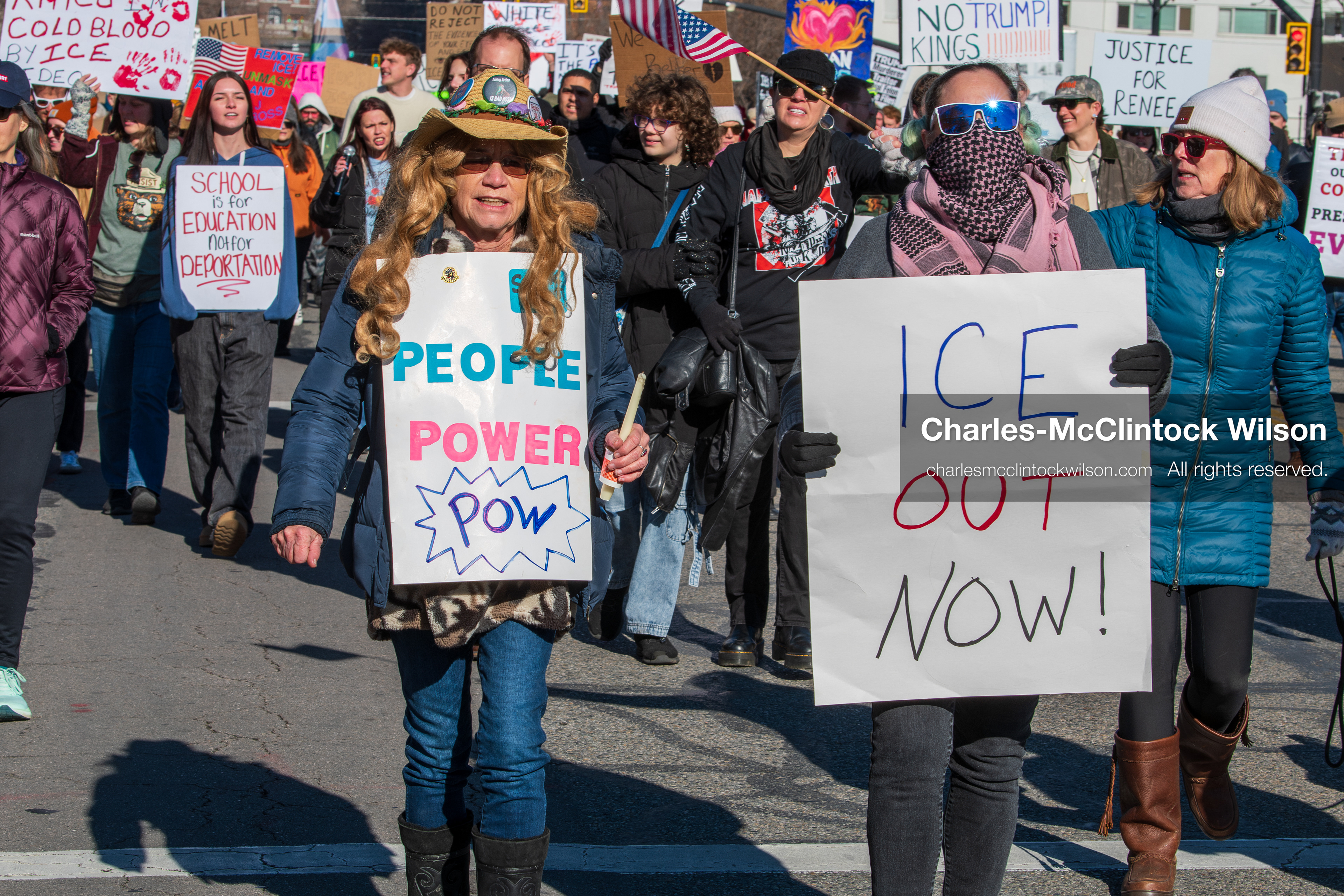 Salt Lake City, Utah, January 10, 2026: A group of demonstrators marches through downtown Salt Lake City during the ICE Out for Good protest, which began at Washington Square Park, with participants carrying signs and personal items as they walk together. (Credit Image: © Charles‑McClintock Wilson/ZUMA Press Wire)