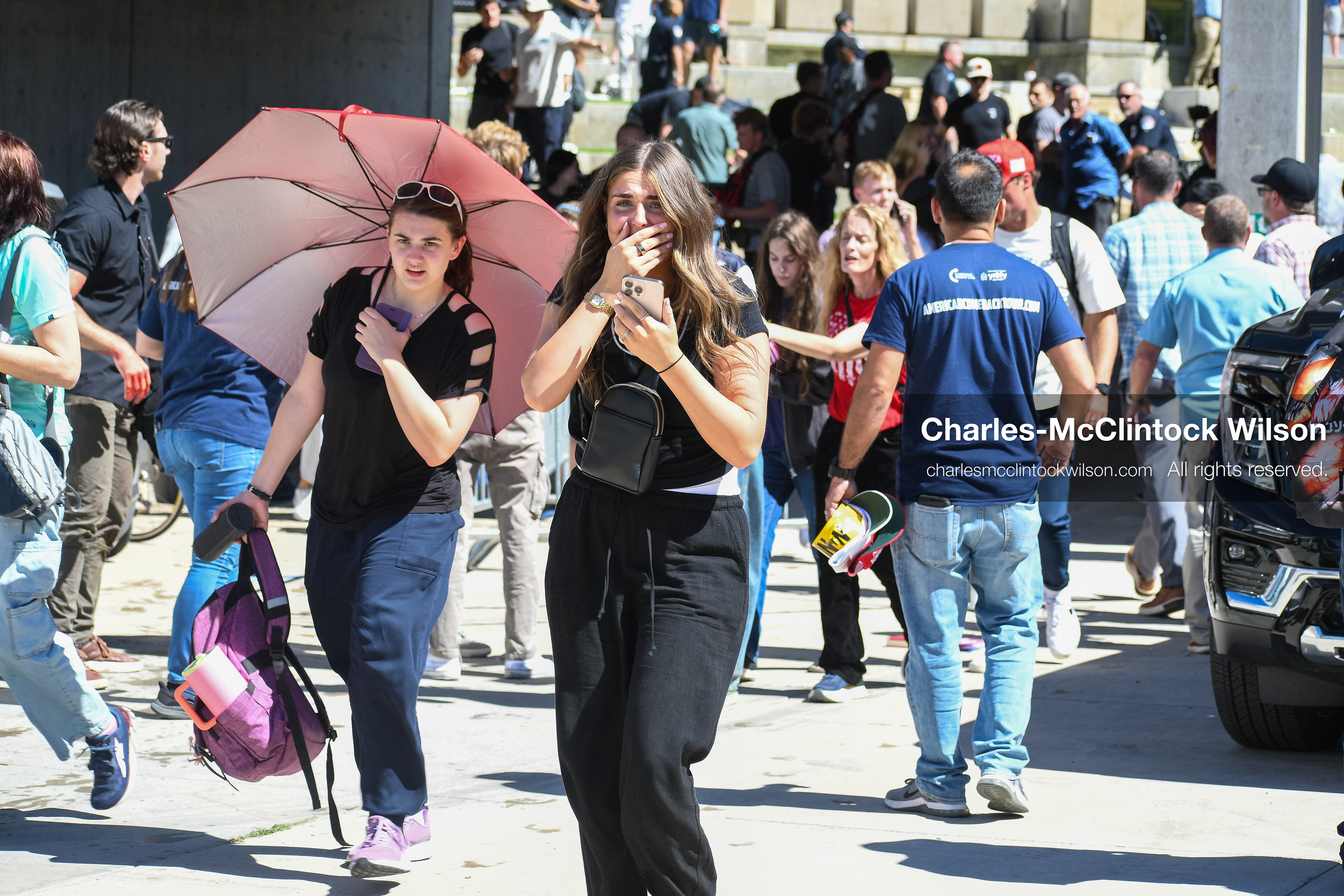 September 10, 2025, Orem, Utah, USA: Attendees flee the scene moments after conservative activist Charlie Kirk is shot during a public event at Utah Valley University. The shooting occurs during a Q&A session with students, approximately two minutes into the exchange. Kirk appears to be struck in the neck. The campus is evacuated as emergency protocols are activated. A university spokesperson states that no suspect is in custody at the time, though an earlier campus alert indicated that police had detained an individual. (Credit Image: © Charles-McClintock Wilson/ZUMA Press Wire)