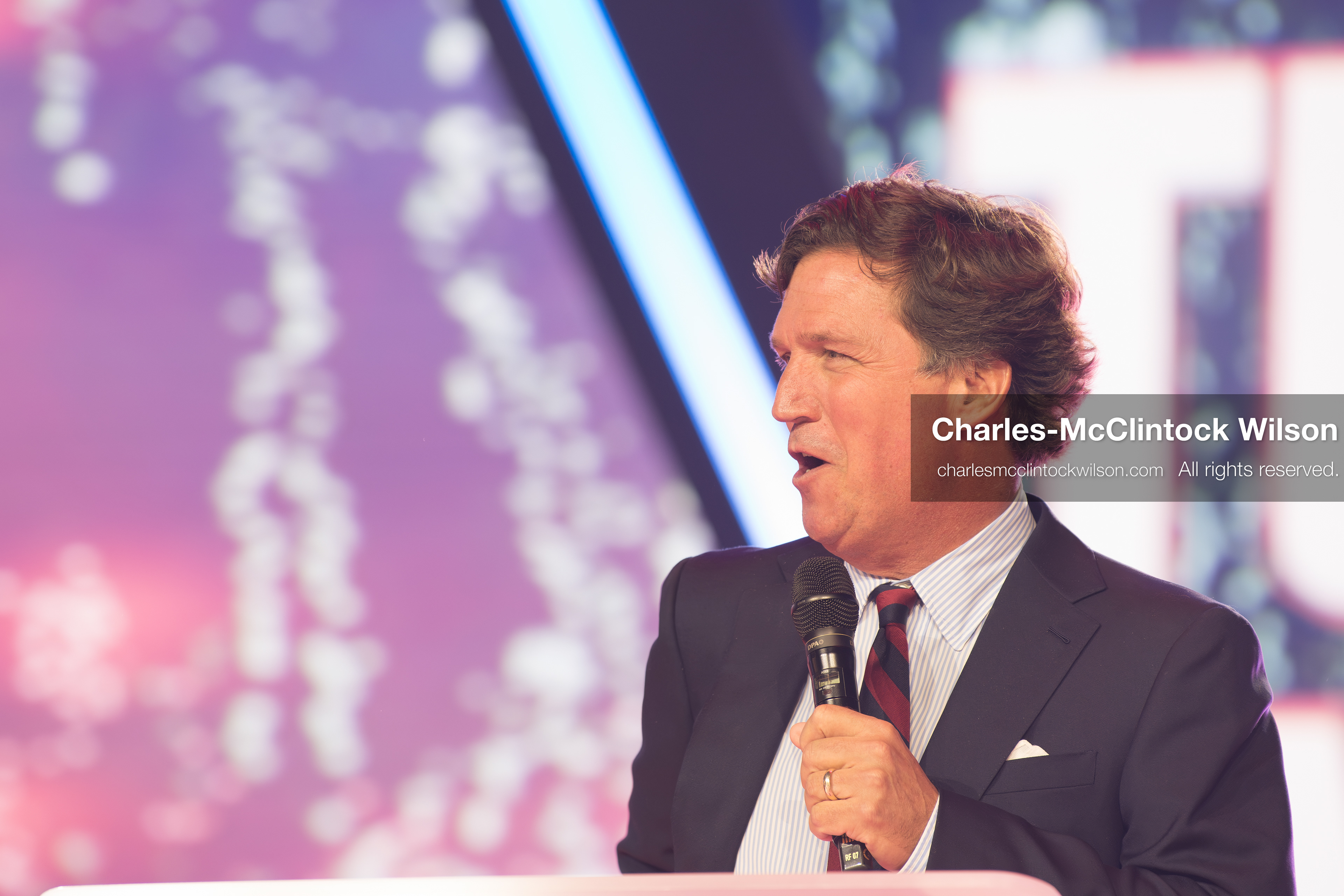 December 18, 2025, Phoenix, Arizona, USA: Tucker Carlson speaks on Day One of Turning Point USA’s AmericaFest 2025 at the Phoenix Convention Center in Phoenix, Arizona.   (Credit Image: © Charles‑McClintock Wilson/ZUMA Press Wire)