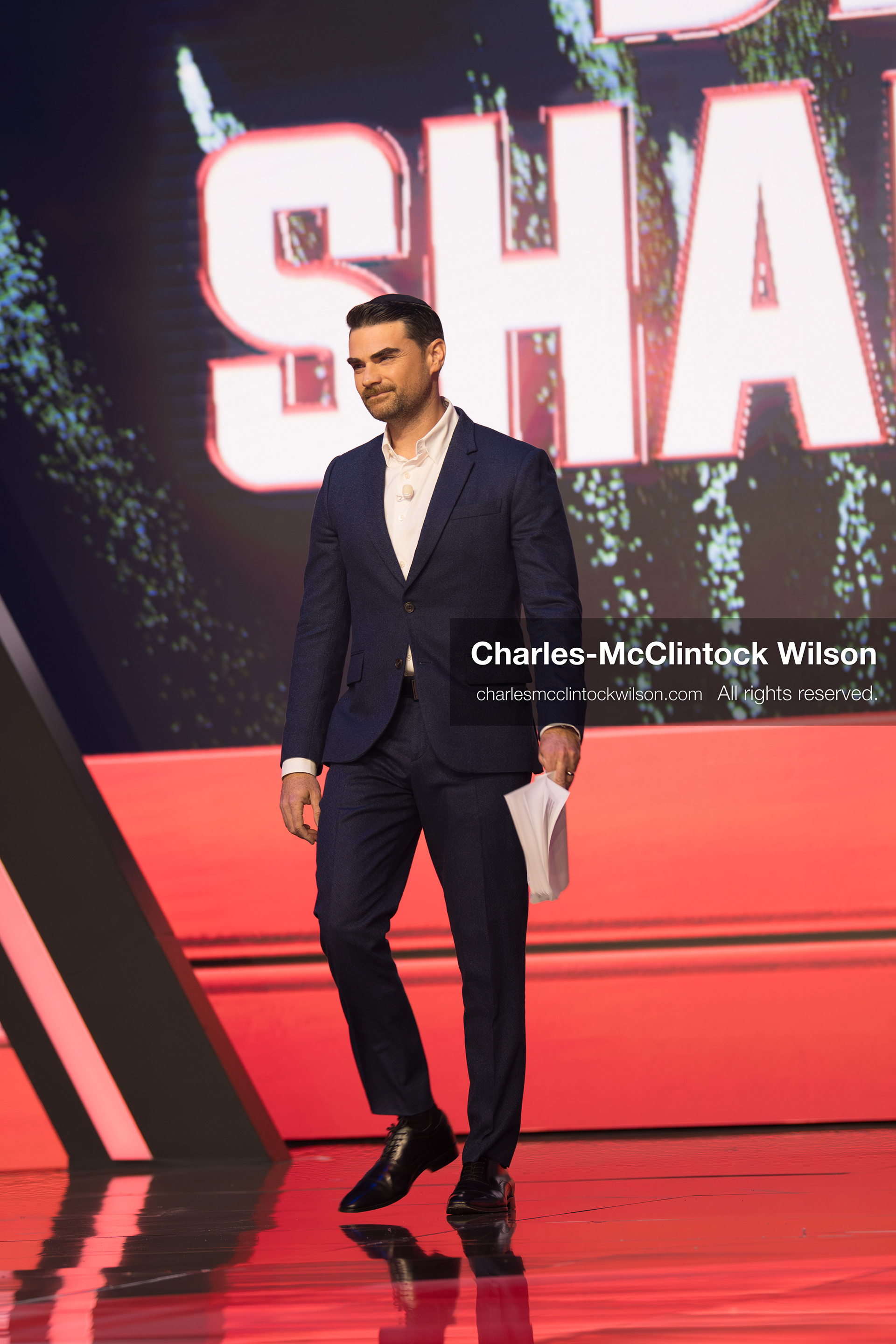 December 18, 2025, Phoenix, Arizona, USA: Ben Shapiro walks toward the stage during Day One of Turning Point USA’s AmericaFest 2025 at the Phoenix Convention Center in Phoenix, Arizona.