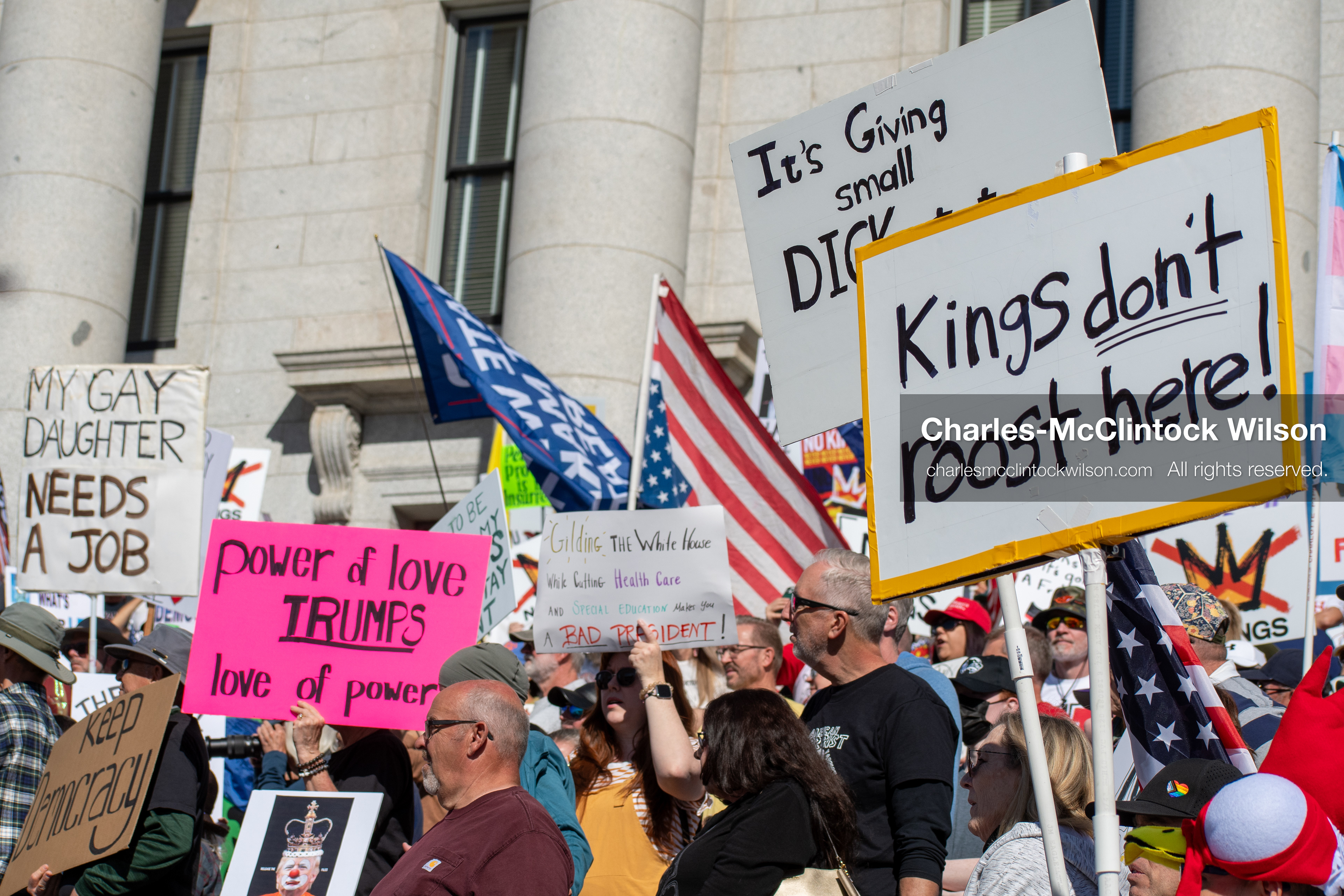 October 18, 2025, Salt Lake City, Utah, USA: Demonstrators participate in a "No Kings" protest held at the Utah State Capitol. Participants hold signs and flags during the public gathering.