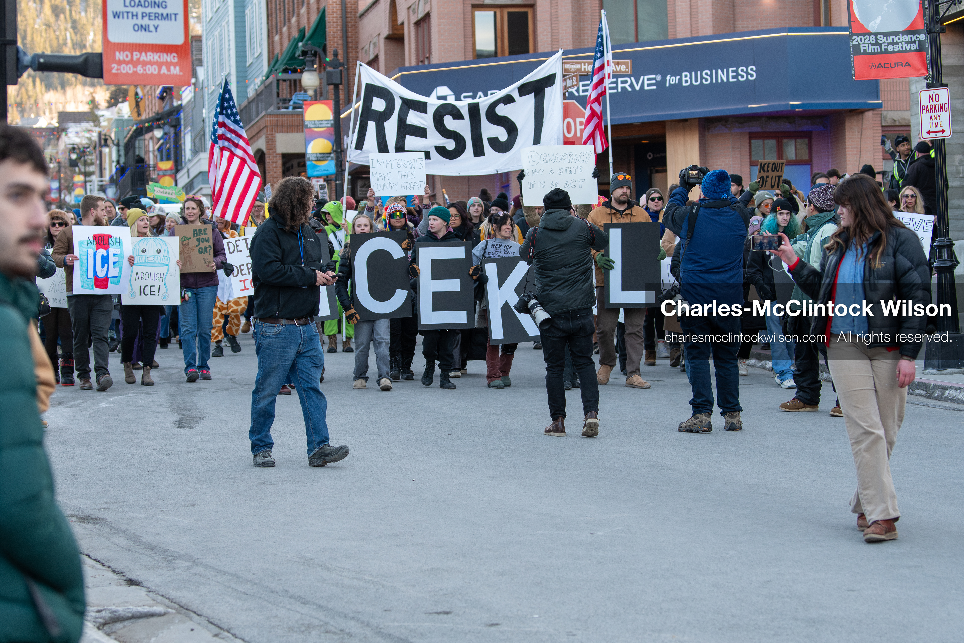 January 26, 2026, Park City, Utah, USA: Demonstrators march through Main Street holding signs during a protest opposing U.S. Immigration and Customs Enforcement (I.C.E.) ICE agents at the Sundance Film Festival in Park City, Utah, on Monday, Jan. 26, 2026. The event was held in response to the fatal shooting of Alex Pretti by a U.S. Border Patrol officer in Minneapolis. (Credit Image: © Charles McClintock Wilson/ZUMA Press Wire)