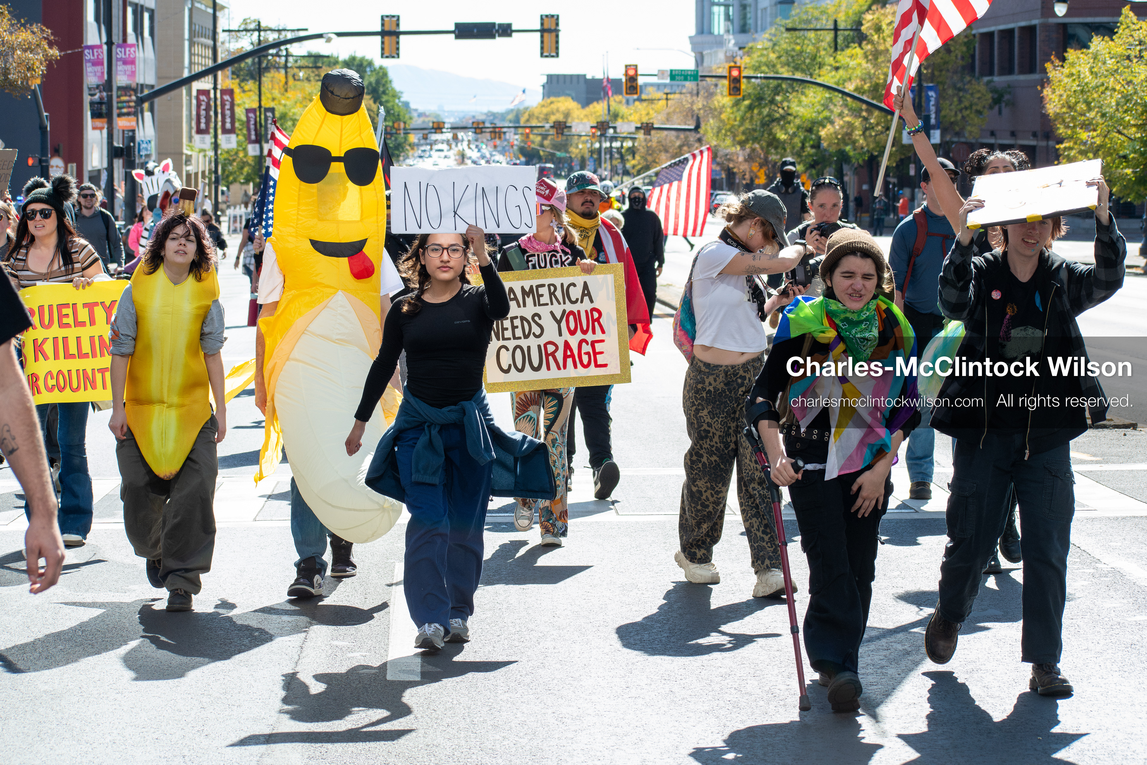October 18, 2025, Salt Lake City, Utah, USA: Demonstrators march along South State Street during a "No Kings" protest in Salt Lake City, Utah. The protest was part of a nationwide mobilization.