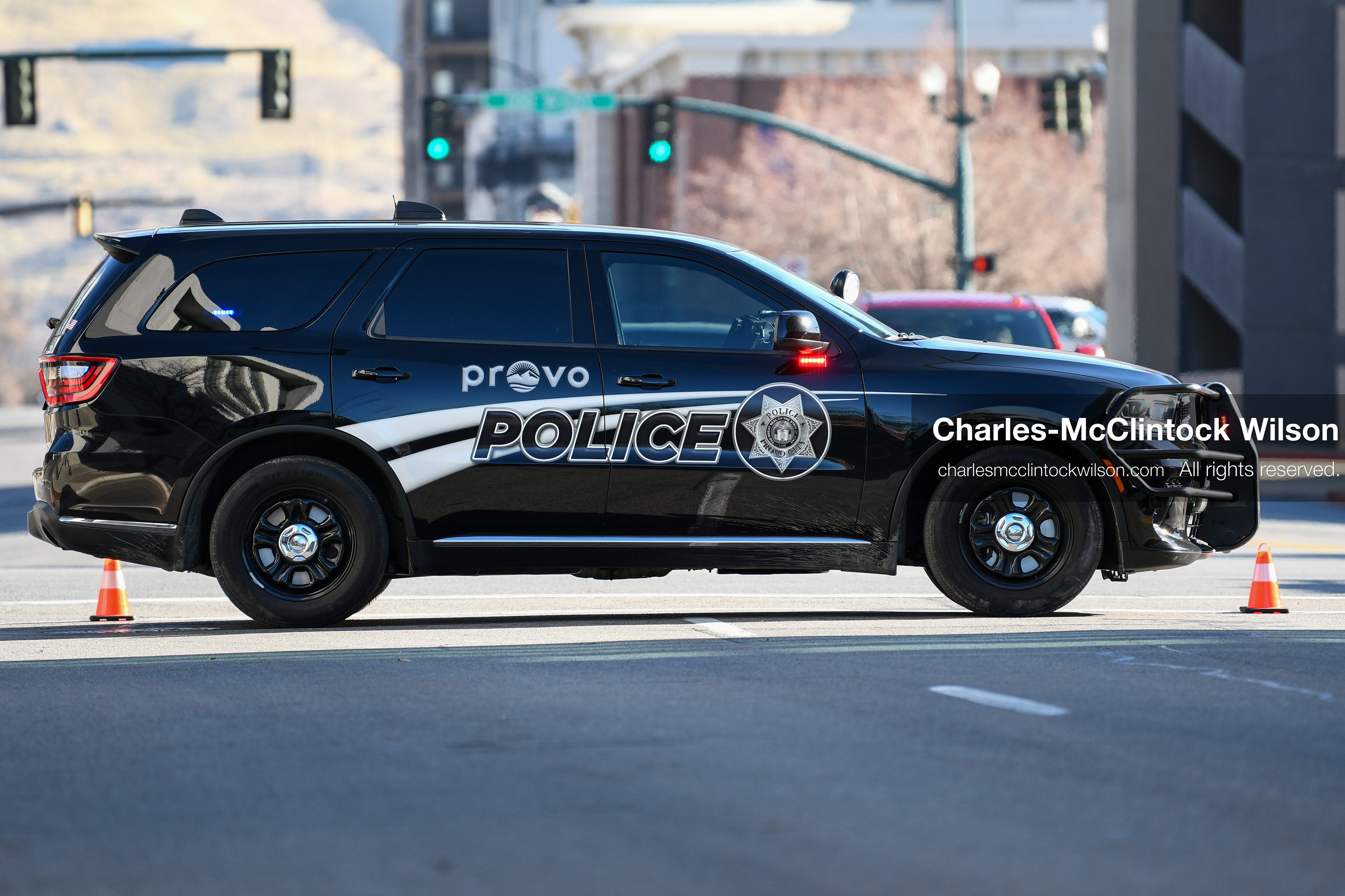 PROVO, UTAH, USA – DECEMBER 11, 2025: A Provo Police cruiser blocks the road near the Fourth District Court in Provo during the first in‑person court appearance of Tyler Robinson in the Charlie Kirk murder case. (Credit Image: © Charles‑McClintock Wilson/ZUMA Press Wire)