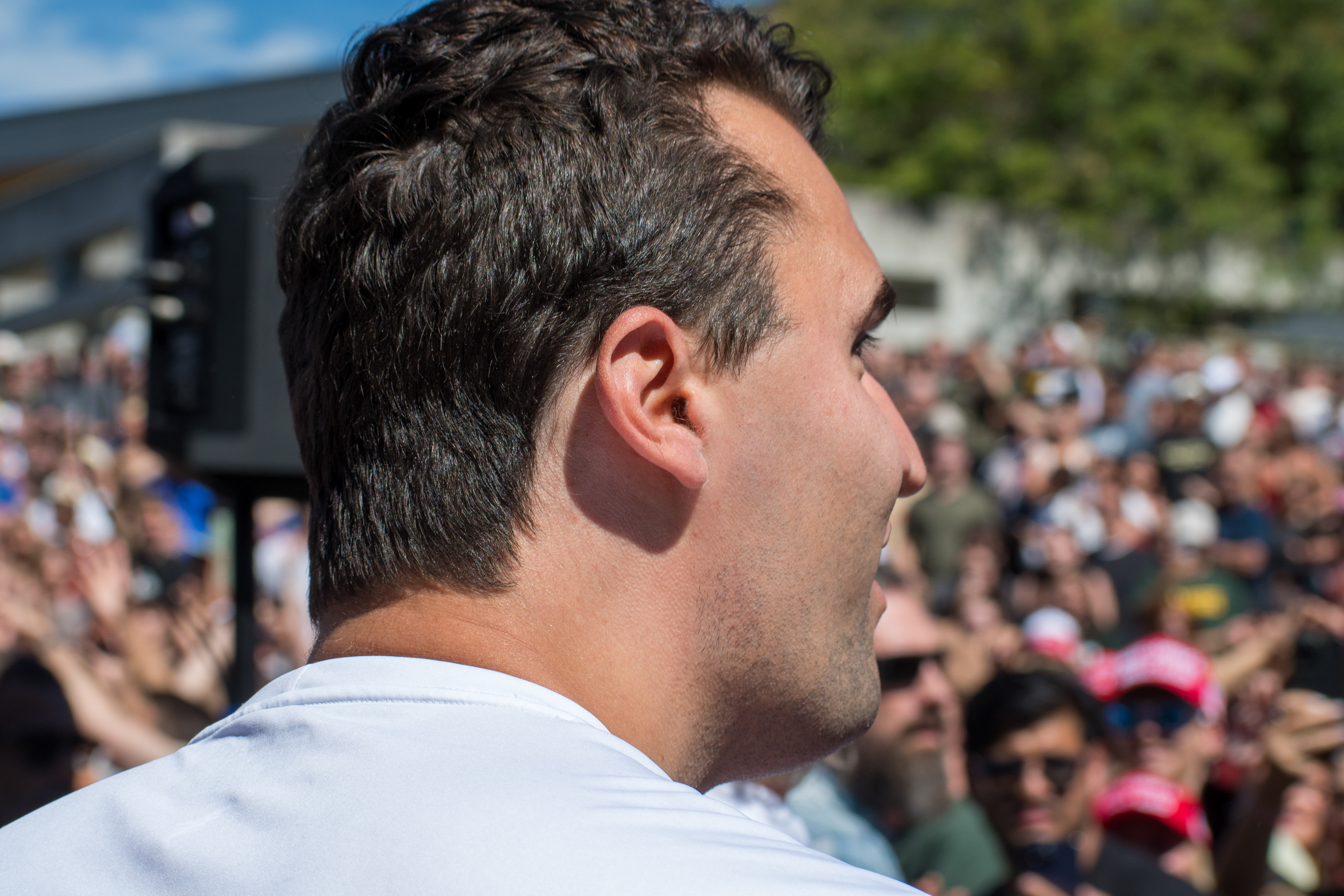 OREM, UTAH – SEPTEMBER 10, 2025: Charlie Kirk stands among supporters during a public event at Utah Valley University. Captured in the foreground as attendees gather around him, Kirk appears engaged and expressive in one of his final public moments. The image reflects the scale and intensity of the crowd’s response, underscoring the civic energy that defined the gathering. © Charles-McClintock Wilson / ZUMA Press