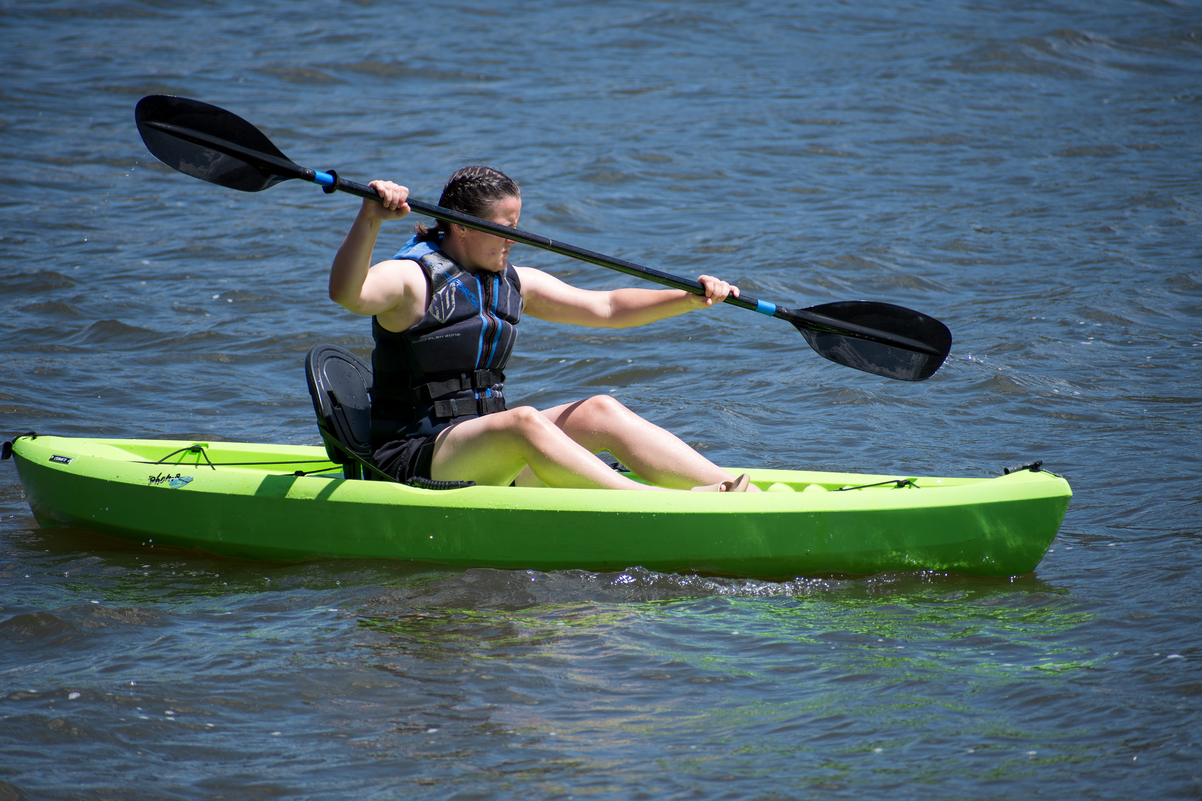 Summit County, Utah – July 20, 2025: A woman paddles a kayak across the calm waters of Smith and Morehouse Reservoir during a peaceful summer outing.