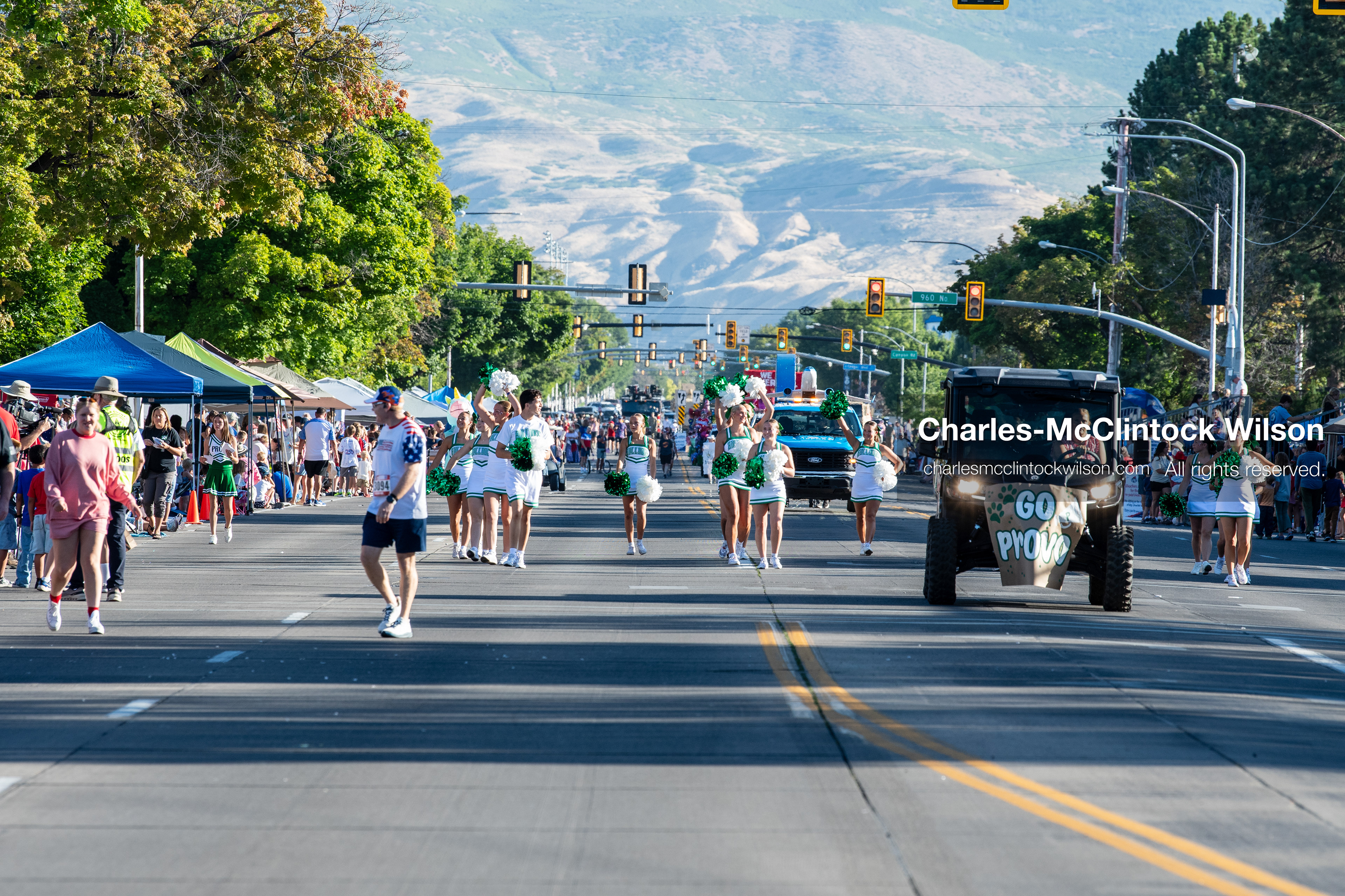 July 4, 2026, Provo, Utah, USA: Cheerleaders holding green and white pom-poms march down the street during America's Freedom Festival Grand Parade in Provo, Utah, Saturday, July 4, 2026. The annual Independence Day event features expanded programming to honor the 250th anniversary of United States independence. (Credit Image: © Charles-McClintock Wilson/ZUMA Press Wire)
