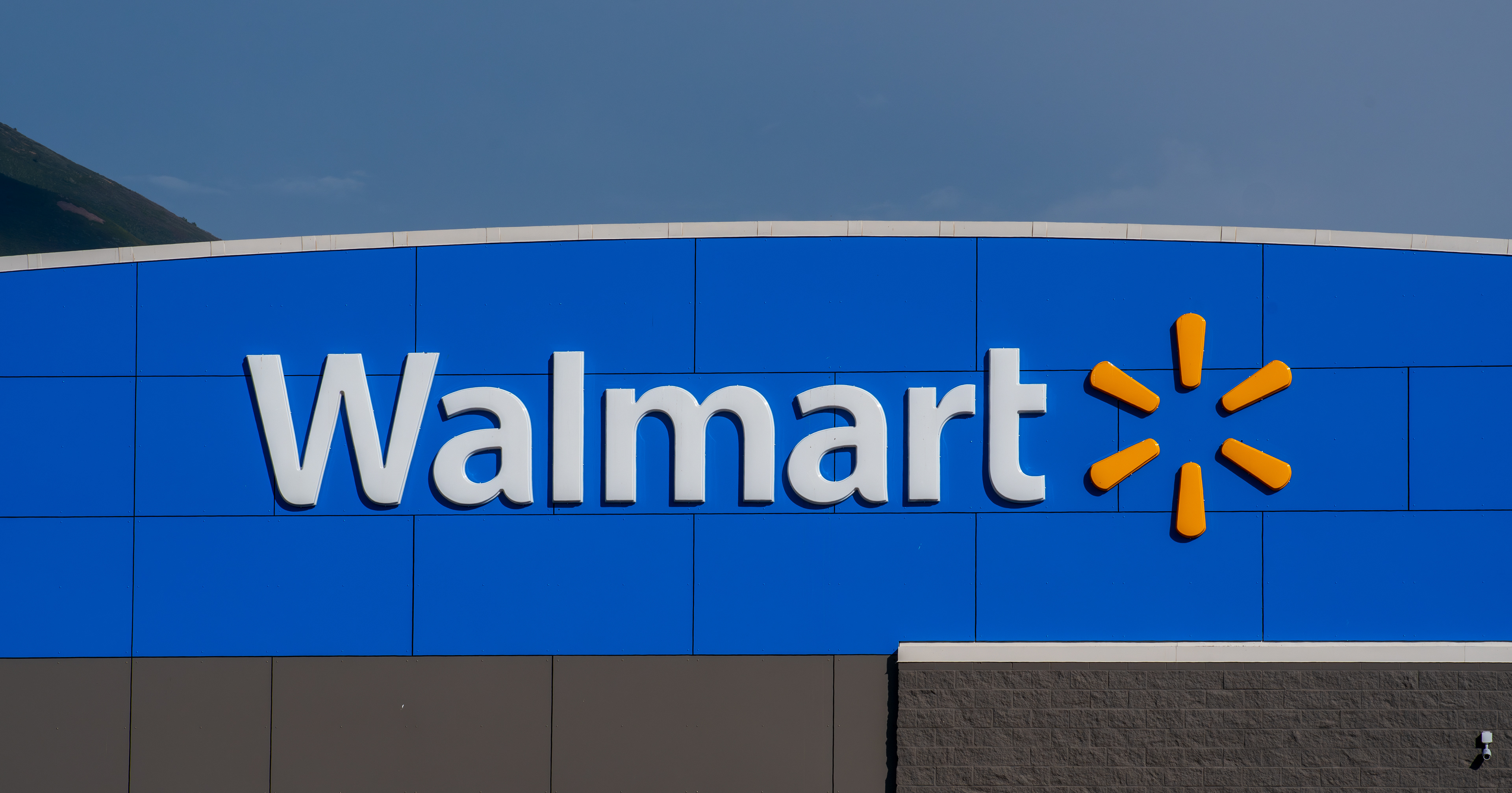 SPANISH FORK, UTAH, USA - JUNE 8, 2025: Exterior view of Walmart storefront. On July 2, 1962, Sam Walton opened the first Walmart store in Rogers, AR.