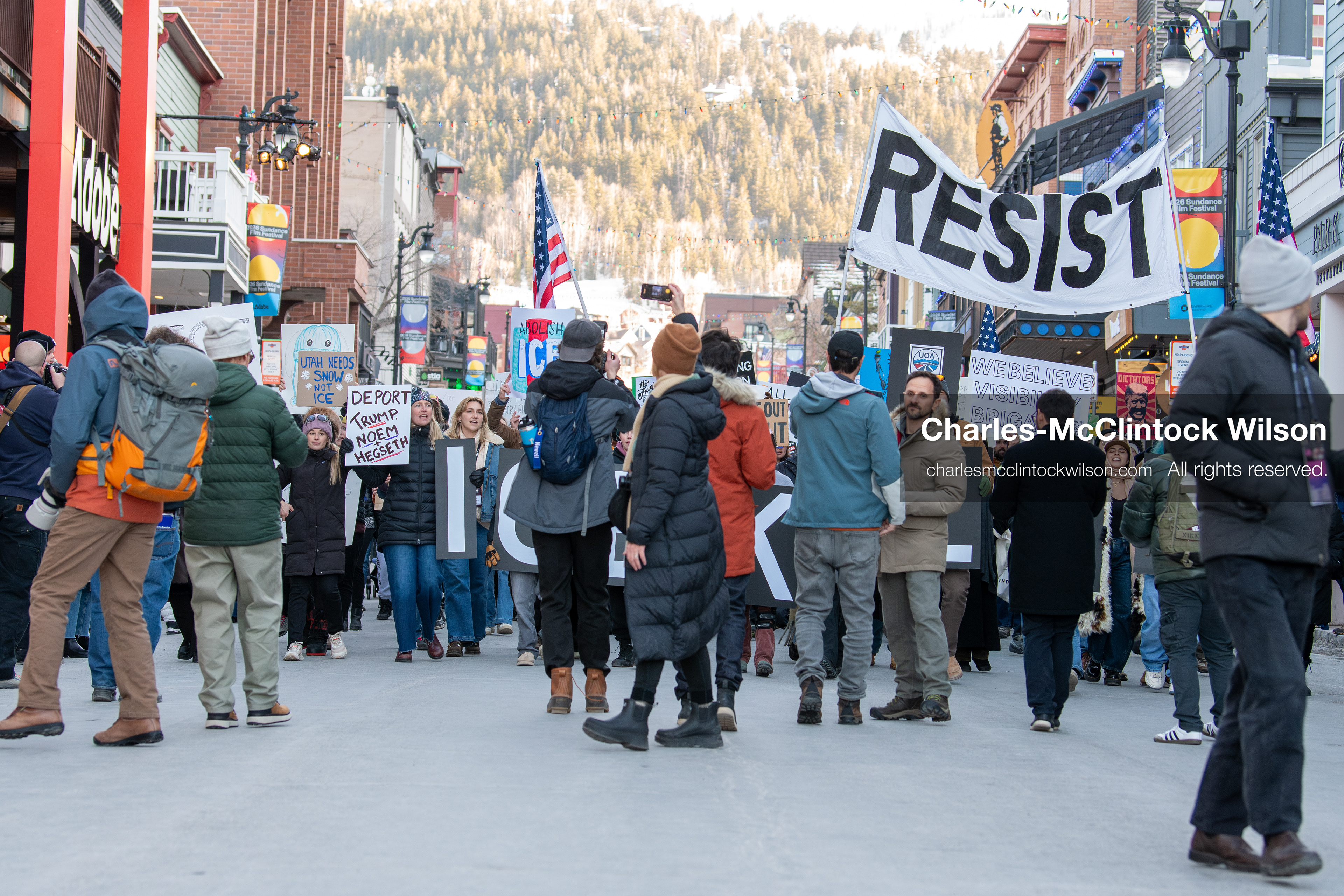 January 26, 2026, Park City, Utah, USA: Demonstrators march through Main Street holding signs during a protest opposing U.S. Immigration and Customs Enforcement (I.C.E.) ICE agents at the Sundance Film Festival in Park City, Utah, on Monday, Jan. 26, 2026. The event was held in response to the fatal shooting of Alex Pretti by a U.S. Border Patrol officer in Minneapolis. (Credit Image: © Charles McClintock Wilson/ZUMA Press Wire)
