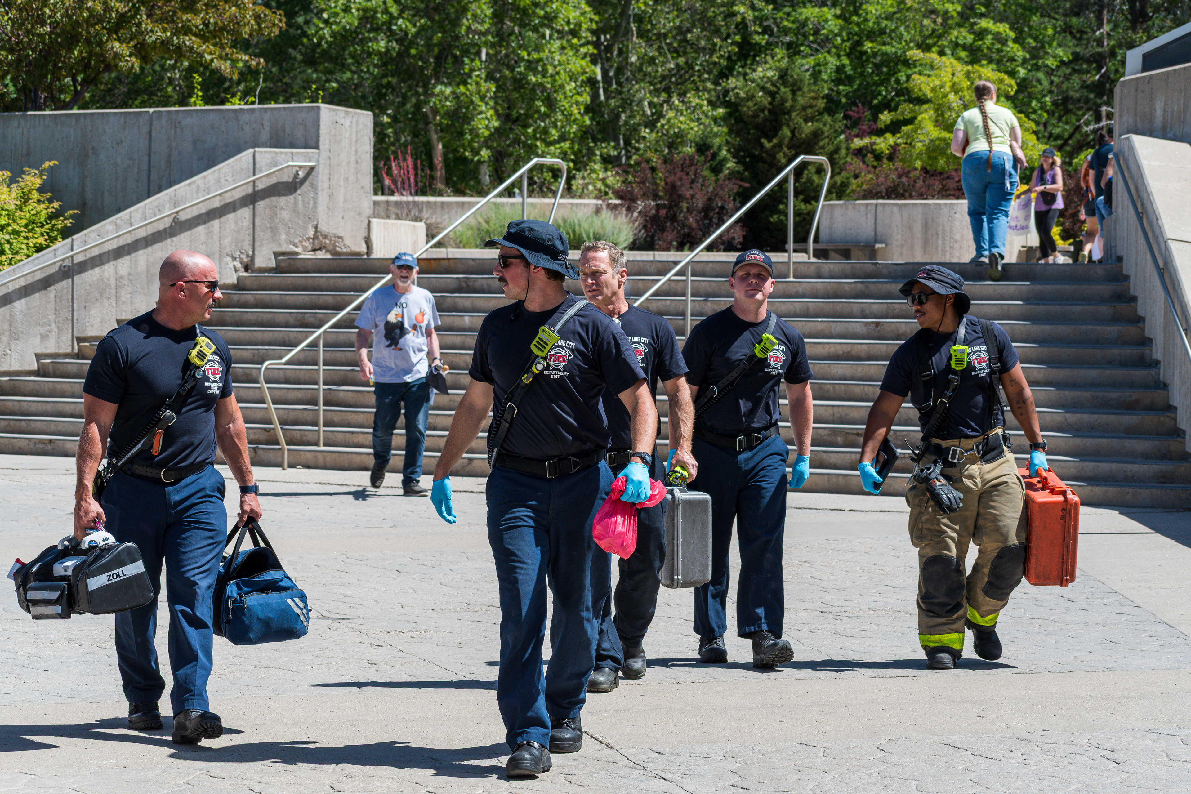 SALT LAKE CITY, UTAH – JUNE 15, 2025: Firefighters arrive at the University of Utah during the “No Kings” protest to provide support and ensure public safety.