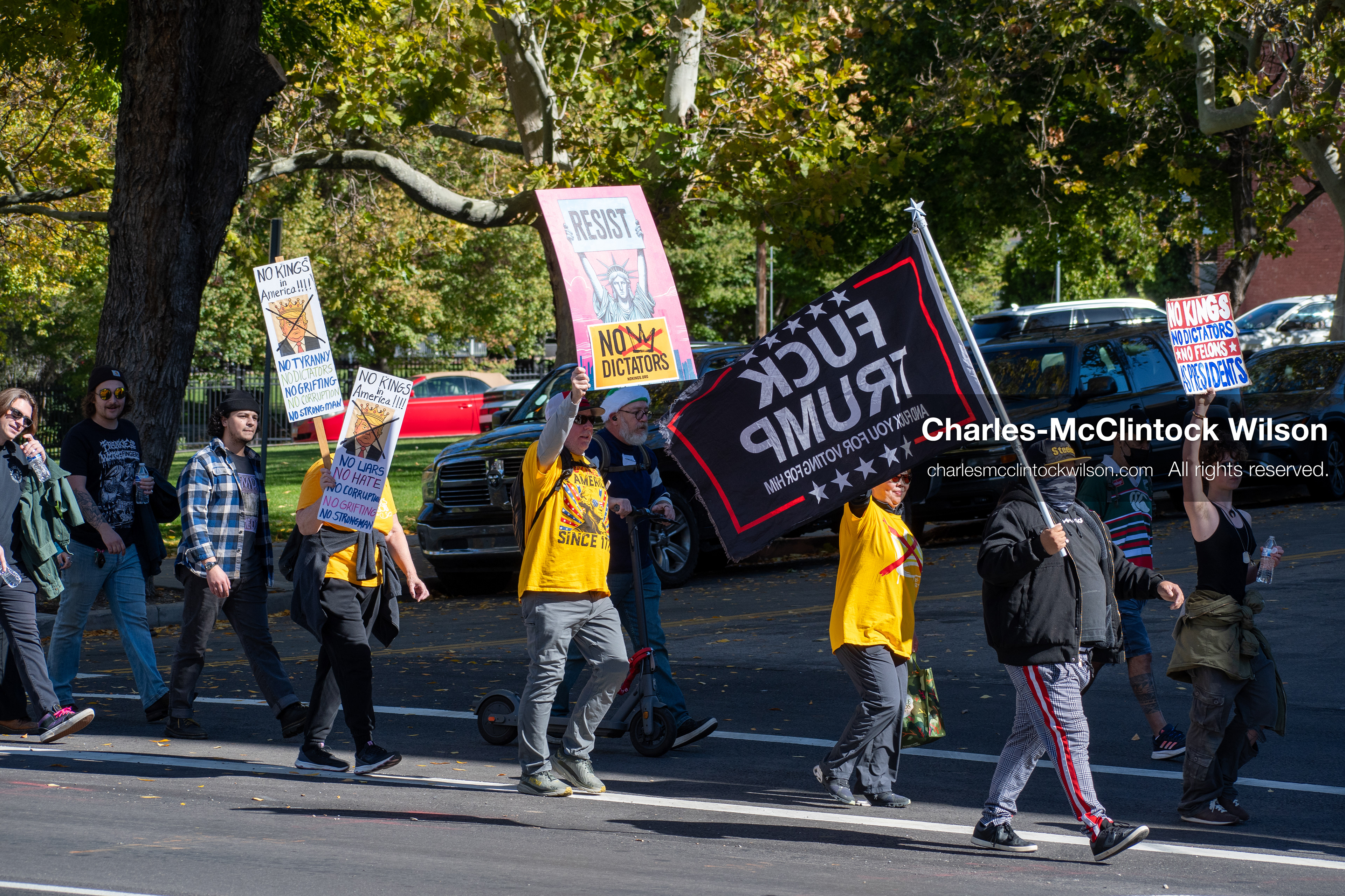 October 18, 2025, Salt Lake City, Utah, USA: Demonstrators march along South State Street during a "No Kings" protest in Salt Lake City, Utah. The protest was part of a nationwide mobilization.