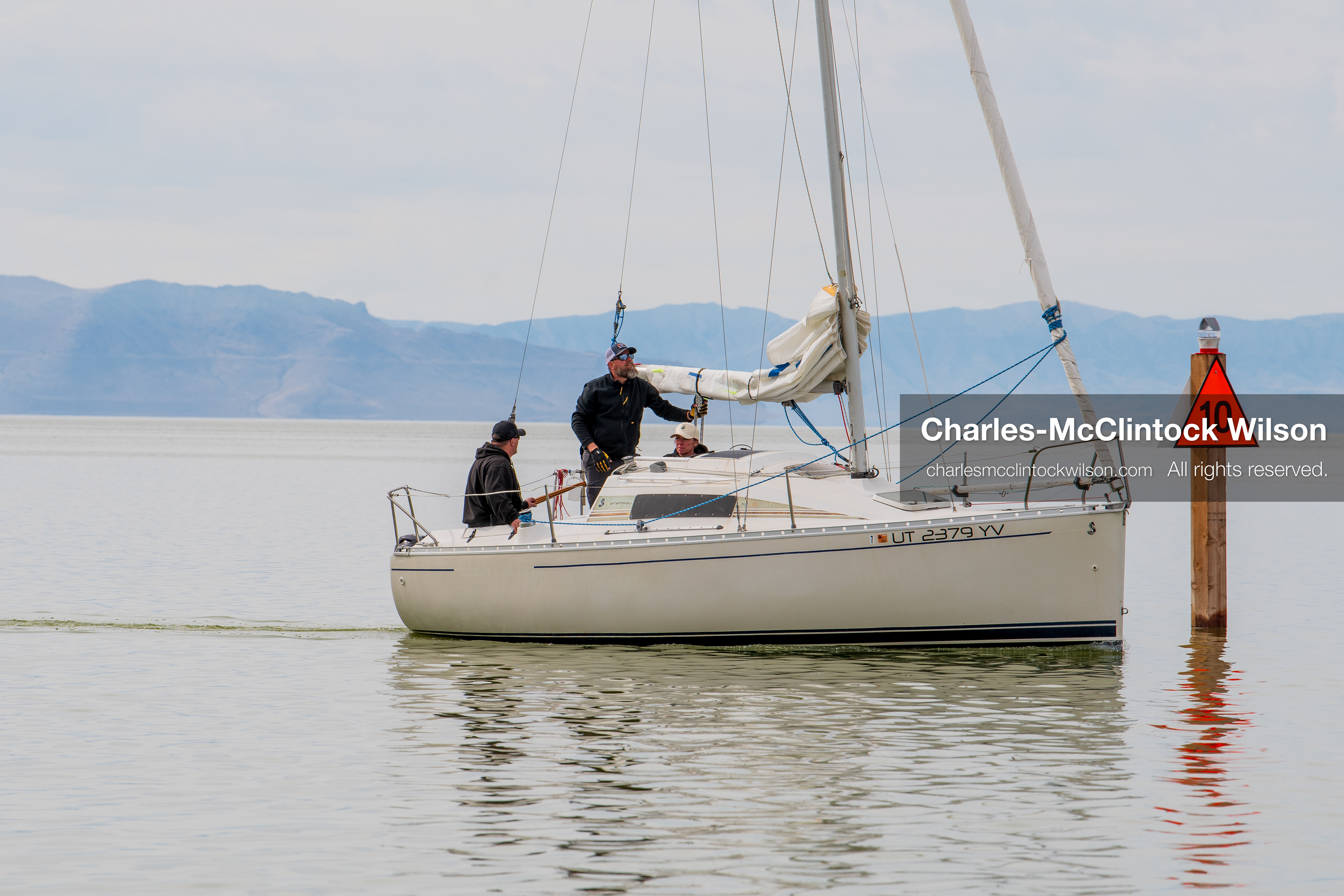 March 1, 2026, Great Salt Lake, Utah, USA: A sailboat moves across calm water at the Great Salt Lake as the region continues to experience historically low water levels. Reports from state officials and the Great Salt Lake Strike Team state that the lake remains in a serious adverse‑effects range, with elevations among the lowest recorded in more than one hundred years. The lake has drawn increased public attention as lawmakers consider large‑scale water projects and long‑term plans to address declining conditions. (Credit Image: © Charles‑McClintock Wilson/ZUMA Press Wire)