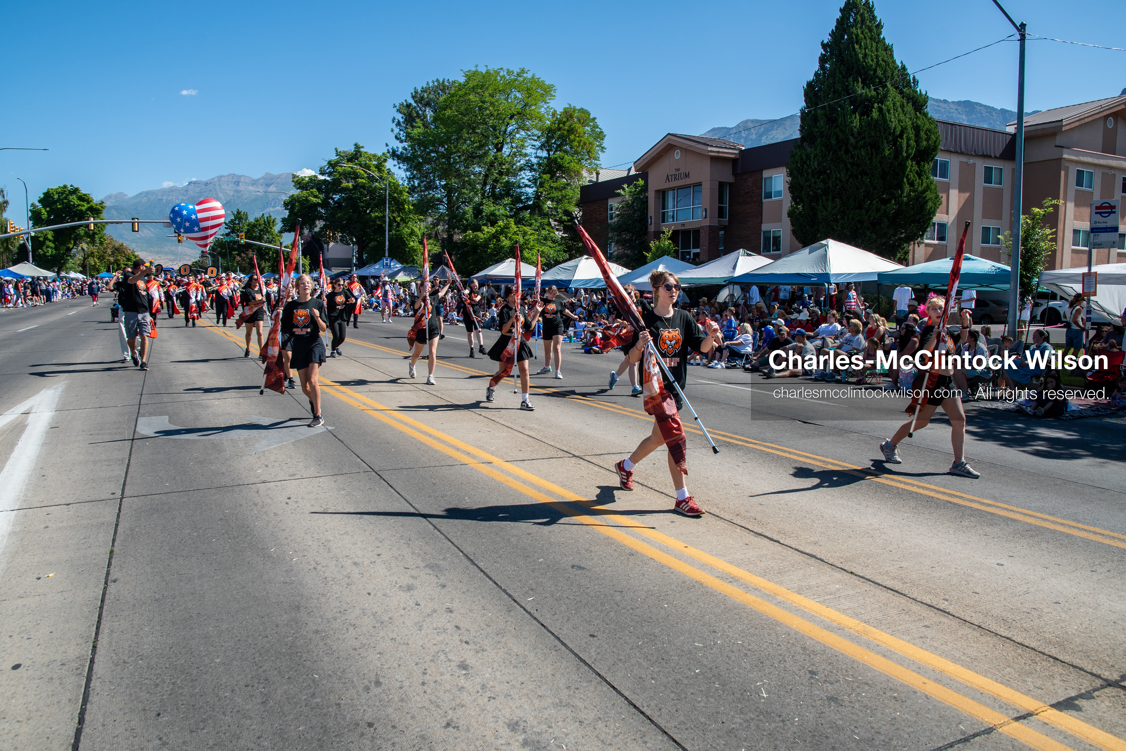 July 4, 2026, Provo, Utah, USA: Members of a high school marching band dressed in maroon and black uniforms play brass instruments while marching down the street during America's Freedom Festival Grand Parade in Provo, Utah, Saturday, July 4, 2026. The annual Independence Day event features expanded programming to honor the 250th anniversary of United States independence. (Credit Image: © Charles-McClintock Wilson/ZUMA Press Wire)
