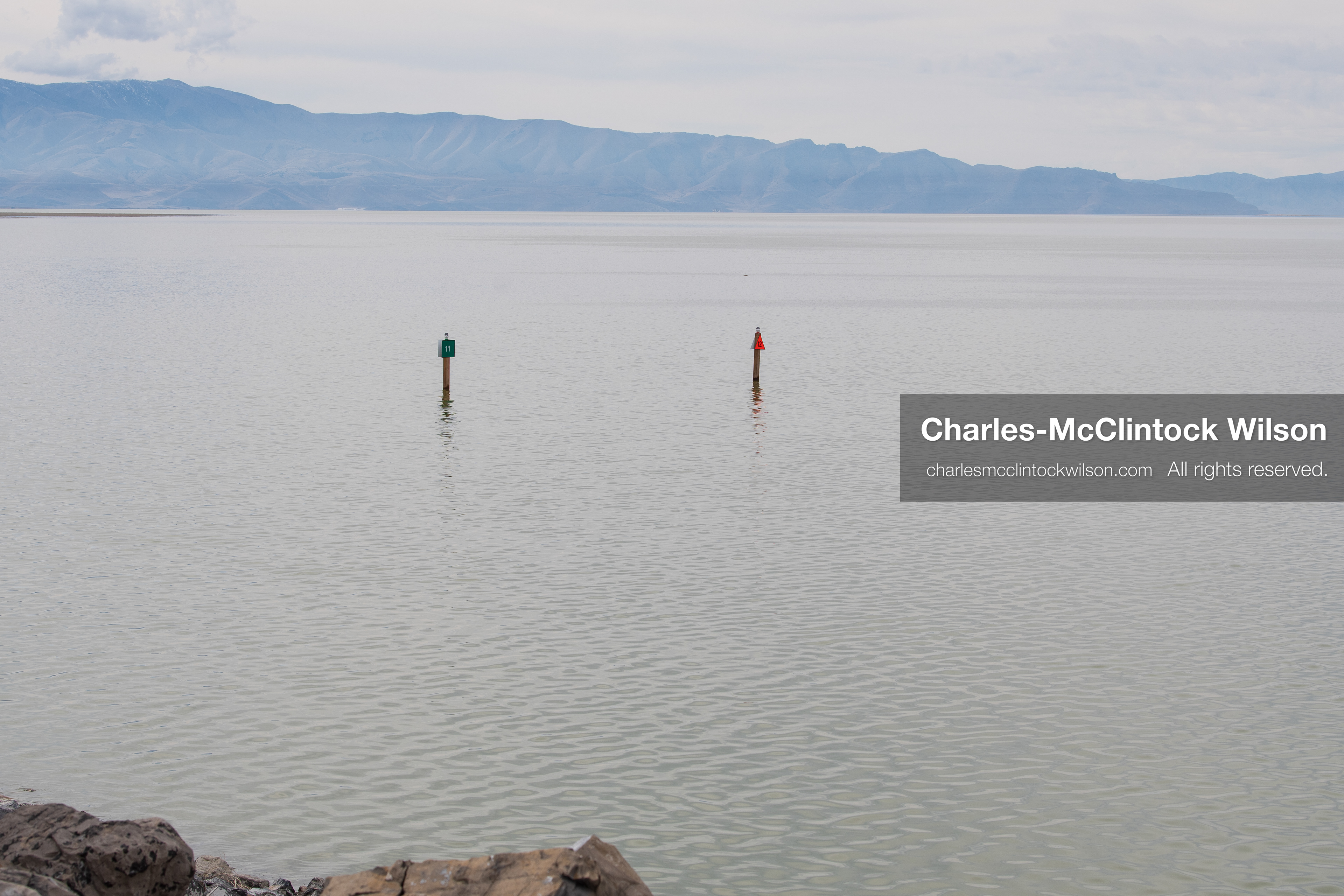 March 1, 2026, Great Salt Lake, Utah, USA: Navigation markers stand in calm water at the Great Salt Lake as the region continues to experience historically low water levels. Reports from state officials and the Great Salt Lake Strike Team state that the lake remains in a serious adverse‑effects range, with elevations among the lowest recorded in more than one hundred years. The lake has drawn increased public attention as lawmakers consider large‑scale water projects and long‑term plans to address declining conditions. (Credit Image: © Charles‑McClintock Wilson/ZUMA Press Wire)
