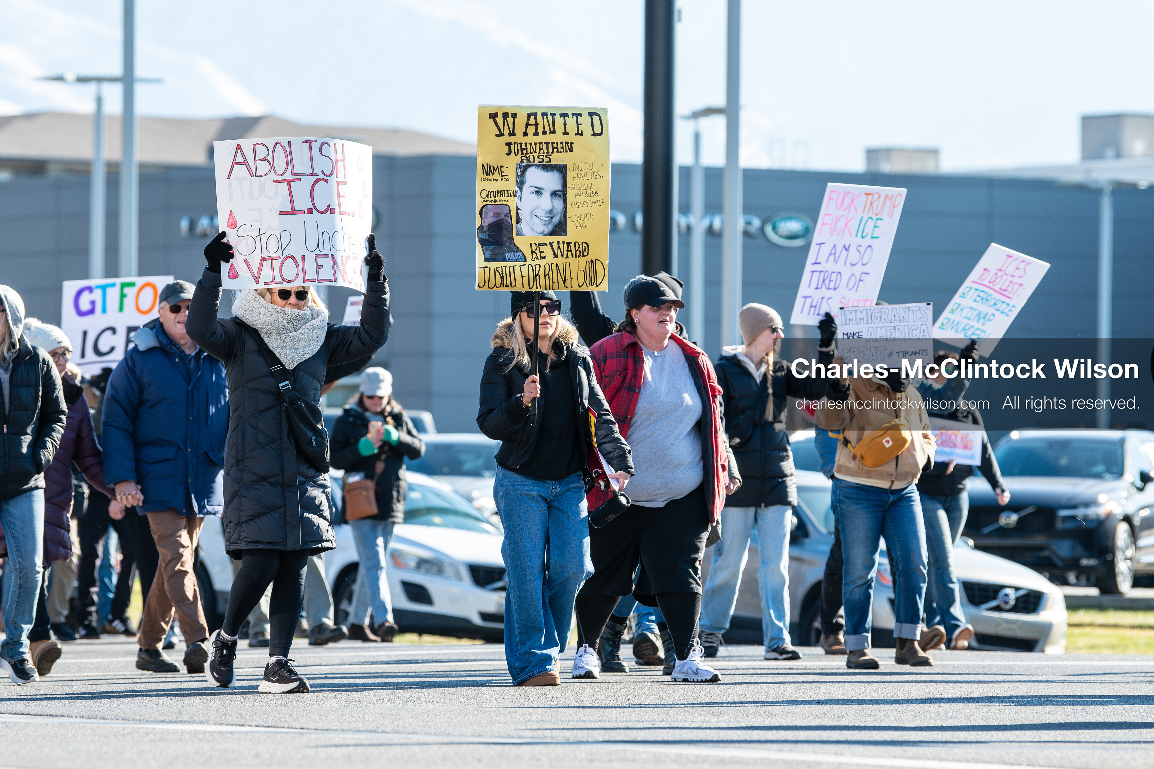 Salt Lake City, Utah, January 10, 2026: A group of demonstrators marches through downtown Salt Lake City during the ICE Out for Good protest, which began at Washington Square Park, with participants carrying signs and personal items as they walk together. (Credit Image: © Charles‑McClintock Wilson/ZUMA Press Wire)