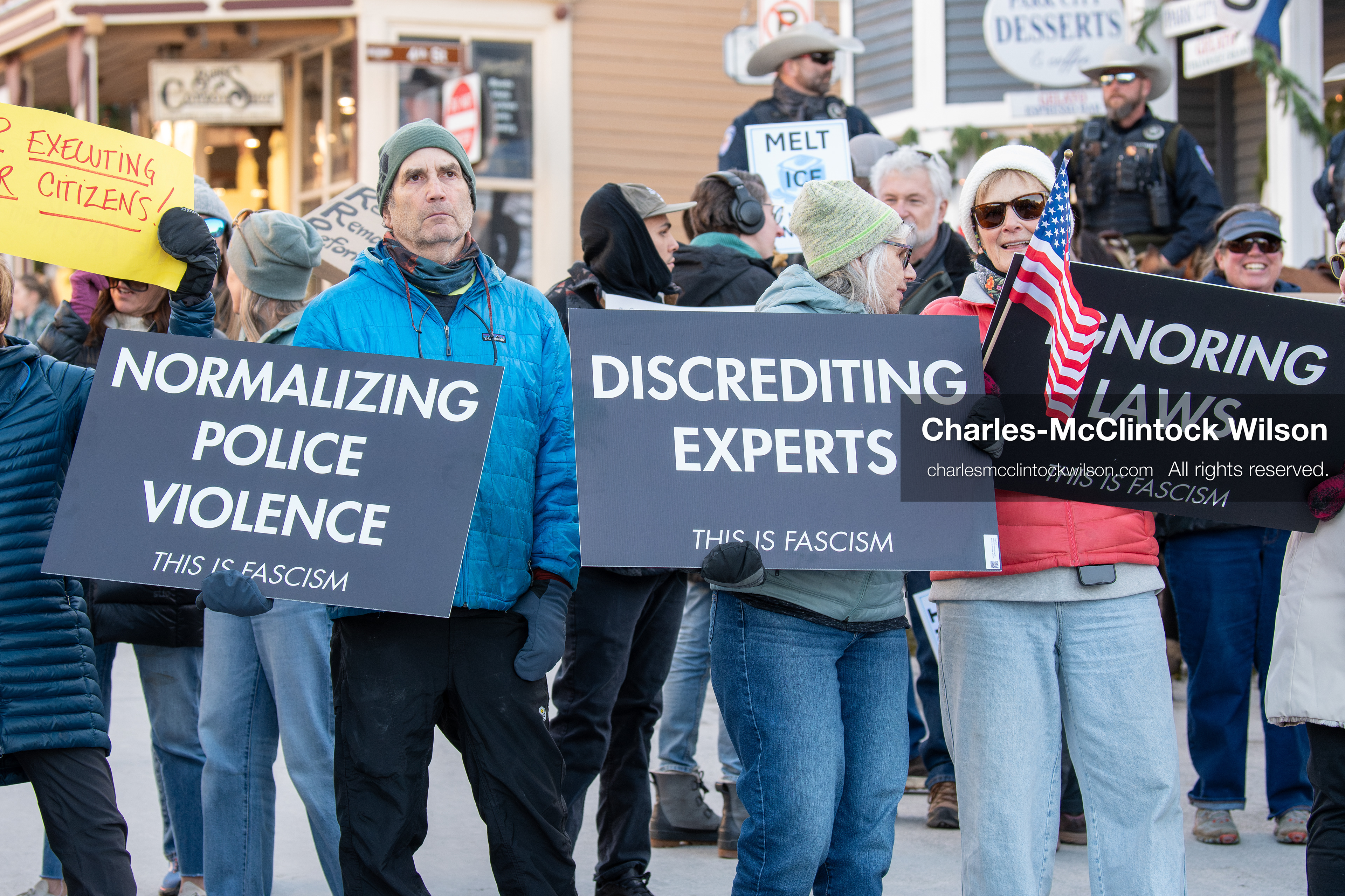 January 26, 2026, Park City, Utah, USA: Demonstrators gather on Main Street holding signs and American flags during a protest opposing U.S. Immigration and Customs Enforcement (I.C.E.) ICE agents at the Sundance Film Festival in Park City, Utah, on Monday, Jan. 26, 2026. The event was held in response to the fatal shooting of Alex Pretti by a U.S. Border Patrol officer in Minneapolis. (Credit Image: © Charles McClintock Wilson/ZUMA Press Wire)