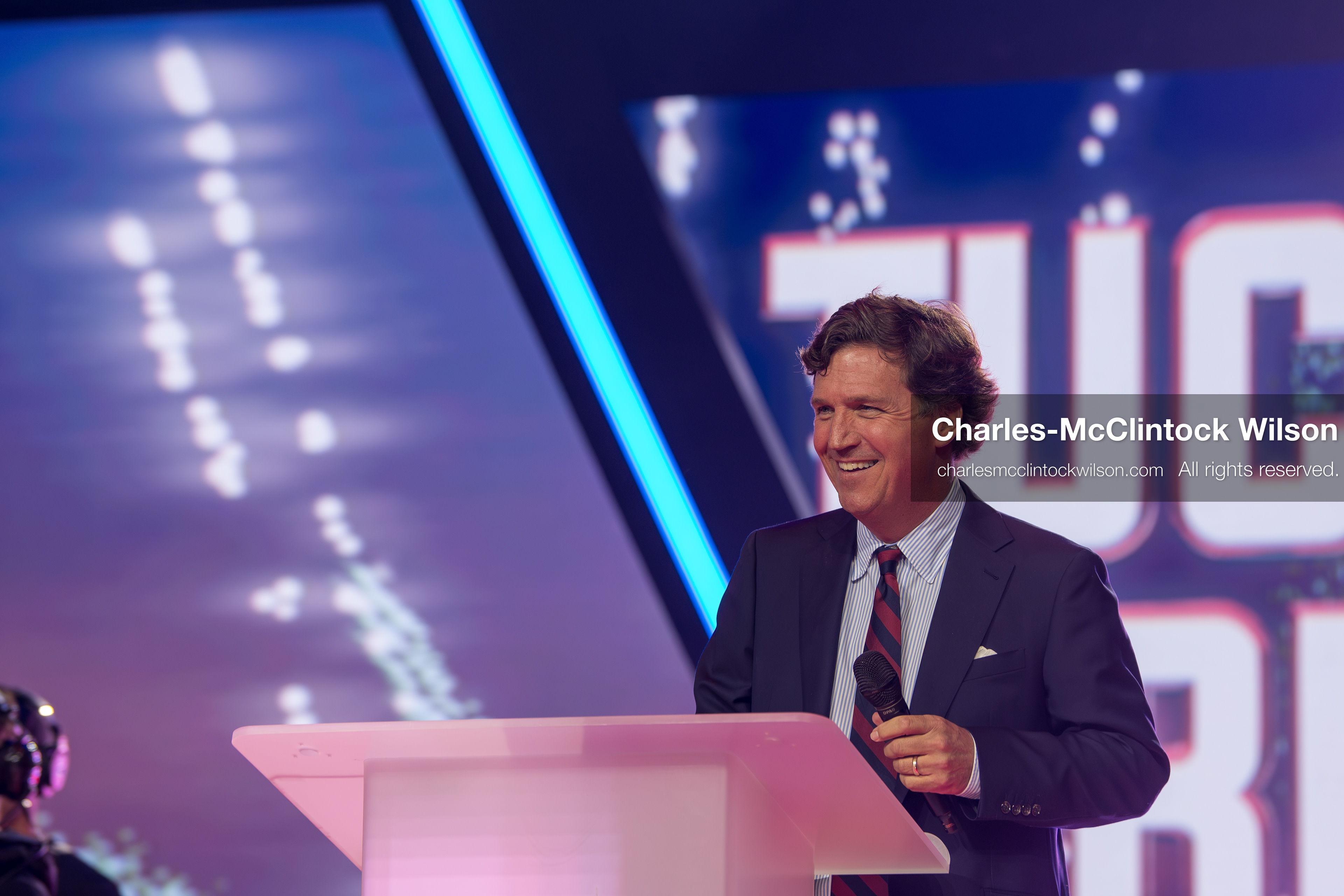 December 18, 2025, Phoenix, Arizona, USA: Tucker Carlson speaks on Day One of Turning Point USA’s AmericaFest 2025 at the Phoenix Convention Center in Phoenix, Arizona.   (Credit Image: © Charles‑McClintock Wilson/ZUMA Press Wire)