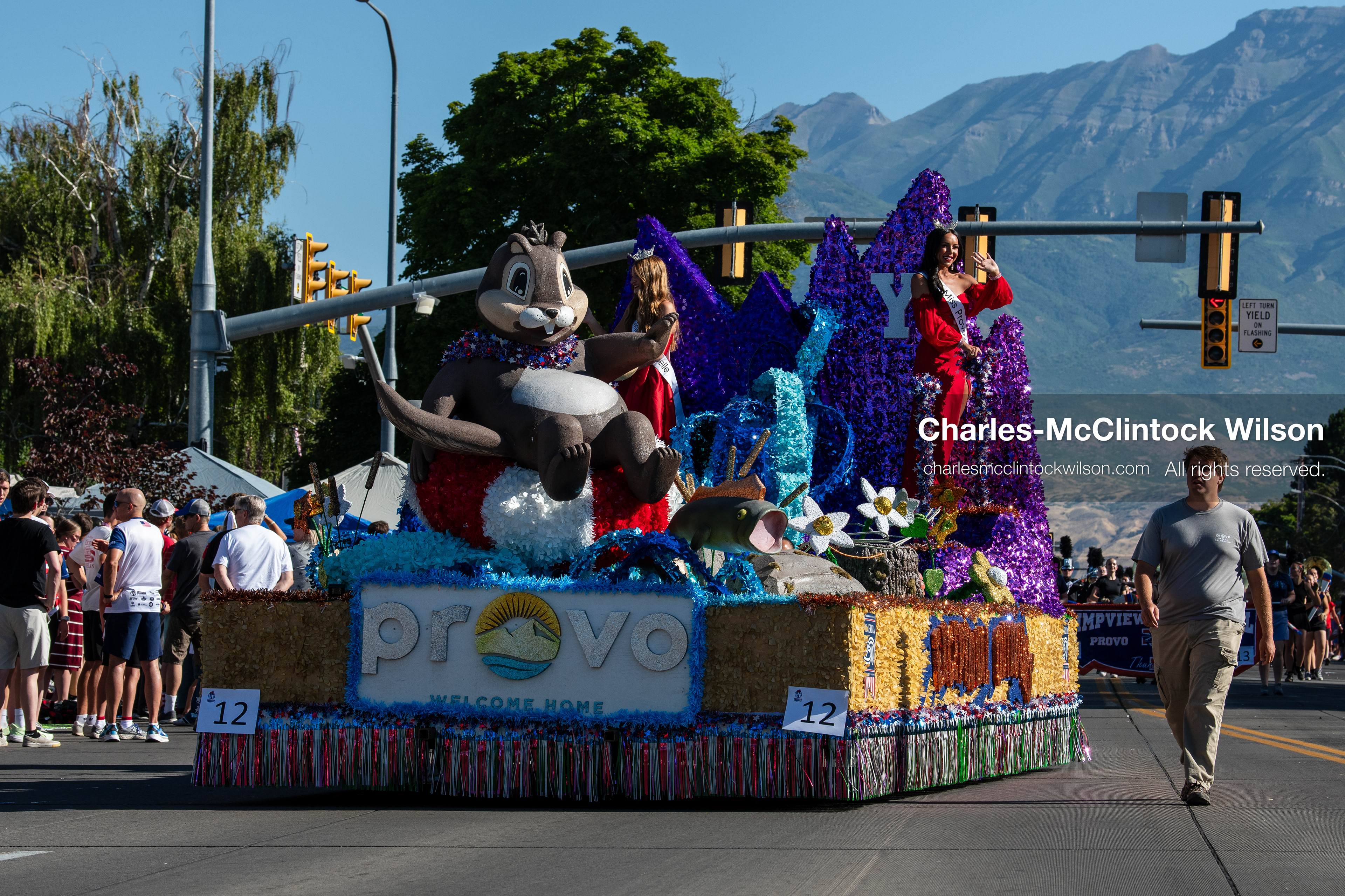 July 4, 2026, Provo, Utah, USA: Performers wave to the crowd from a decorated parade float during America's Freedom Festival Grand Parade in Provo, Utah, Saturday, July 4, 2026. The annual event drew thousands of spectators to the downtown corridor. (Credit Image: © Charles-McClintock Wilson/ZUMA Press Wire)