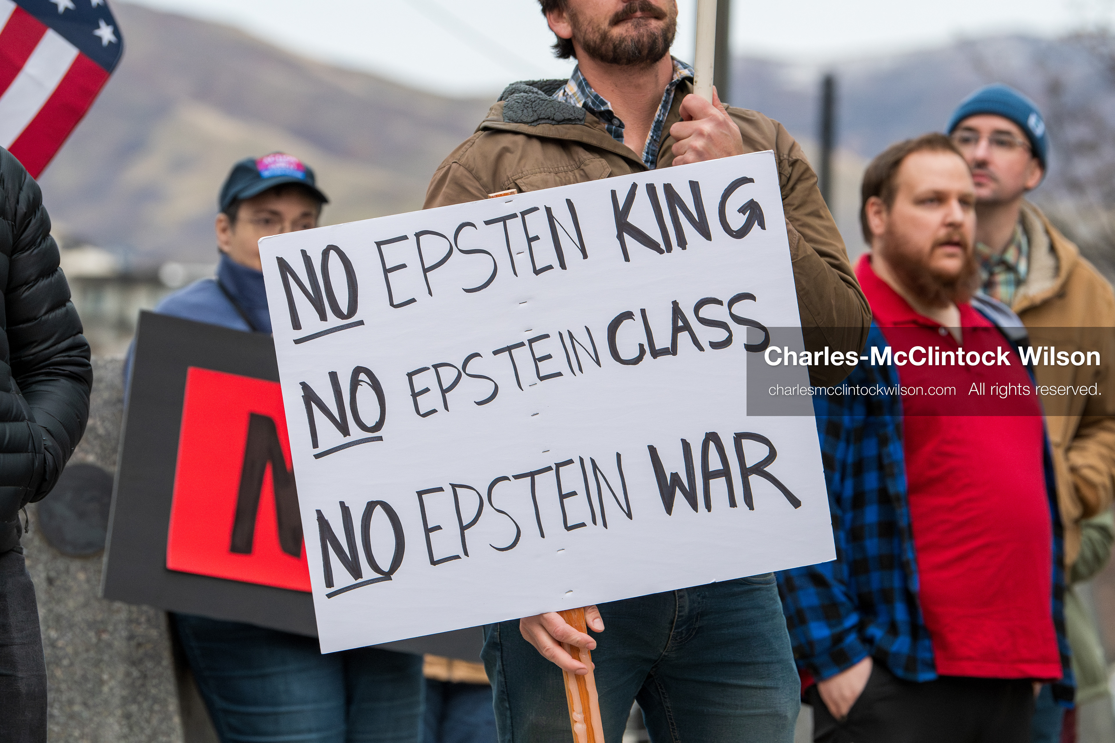 January 3, 2026, Salt Lake City, Utah, USA: A protester holds a sign during a demonstration against US action in Venezuela outside the Wallace Federal Building in Salt Lake City, Utah. The protest was part of a nationwide mobilization responding to recent military developments. (Credit Image: (c) Charles‑McClintock Wilson/ZUMA Press Wire)
