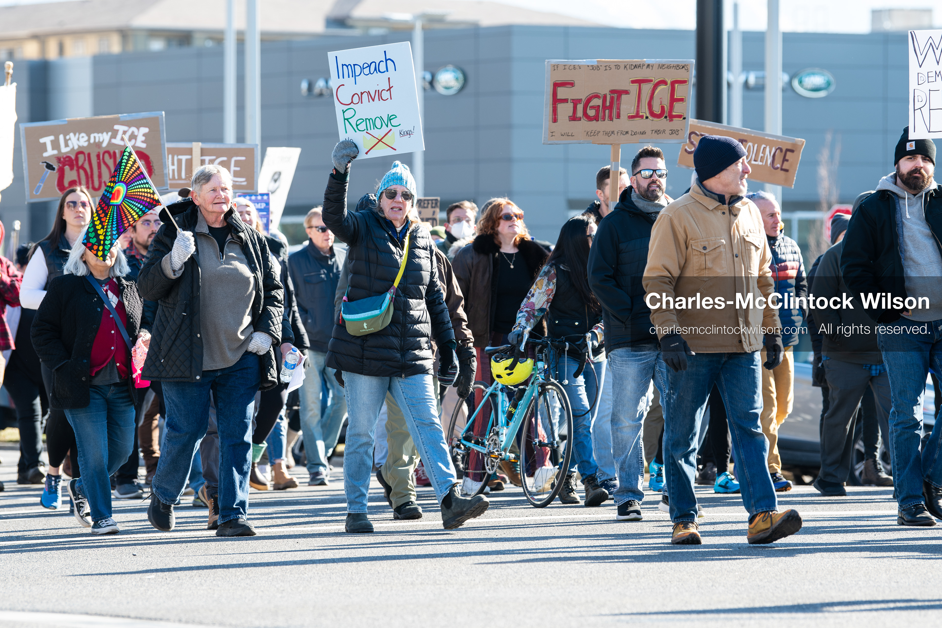 Salt Lake City, Utah, January 10, 2026: A group of demonstrators marches through downtown Salt Lake City during the ICE Out for Good protest, which began at Washington Square Park, with participants carrying signs and personal items as they walk together. (Credit Image: © Charles‑McClintock Wilson/ZUMA Press Wire)