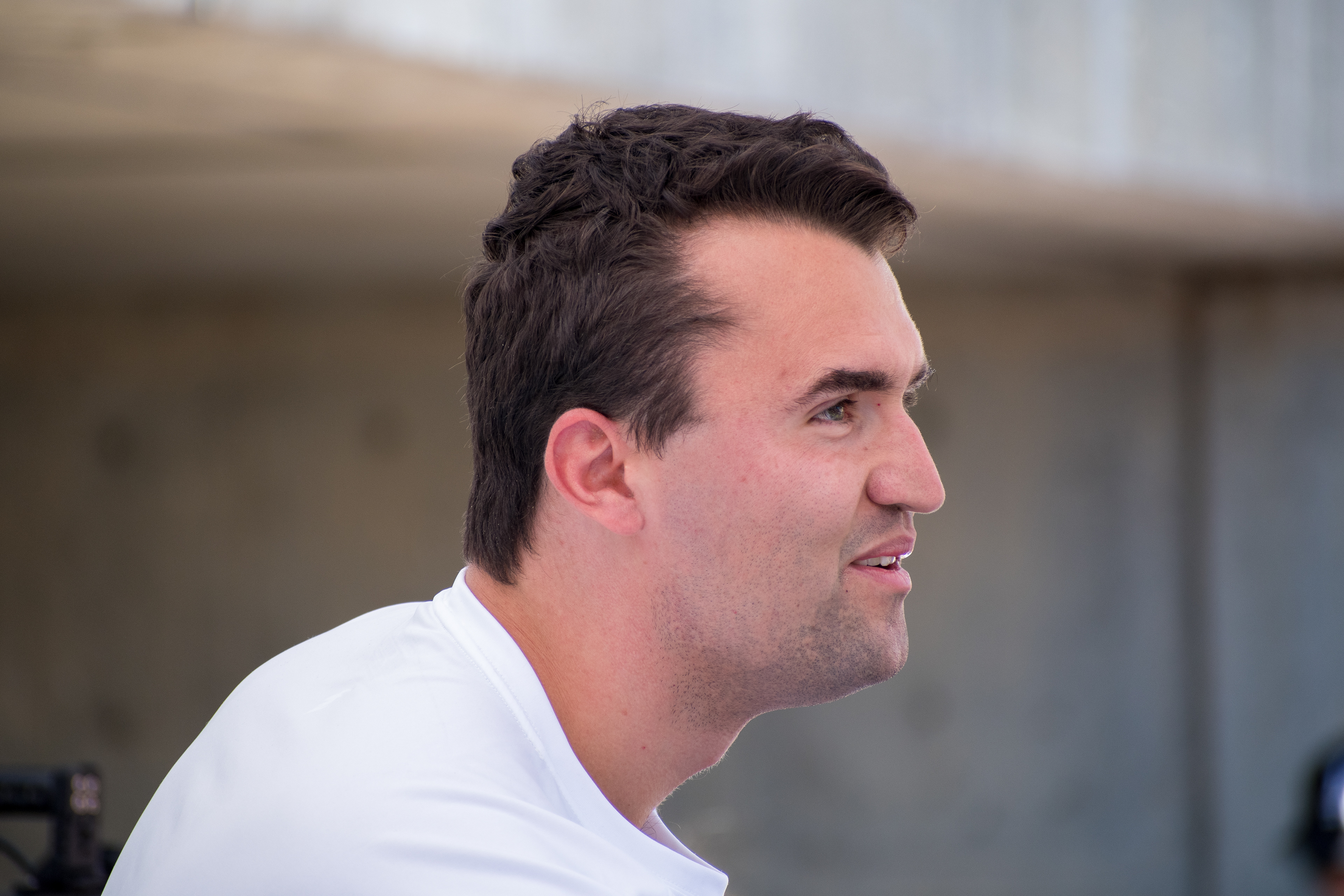 OREM, UTAH – SEPTEMBER 10, 2025: Charlie Kirk appears focused and resolute during a public event at Utah Valley University. Captured in a moment of quiet intensity, Kirk looks off-camera as media lenses track his movements. The image reflects the tension and conviction that defined his final public appearance before the shooting incident that disrupted the event. © Charles-McClintock Wilson / ZUMA Press 