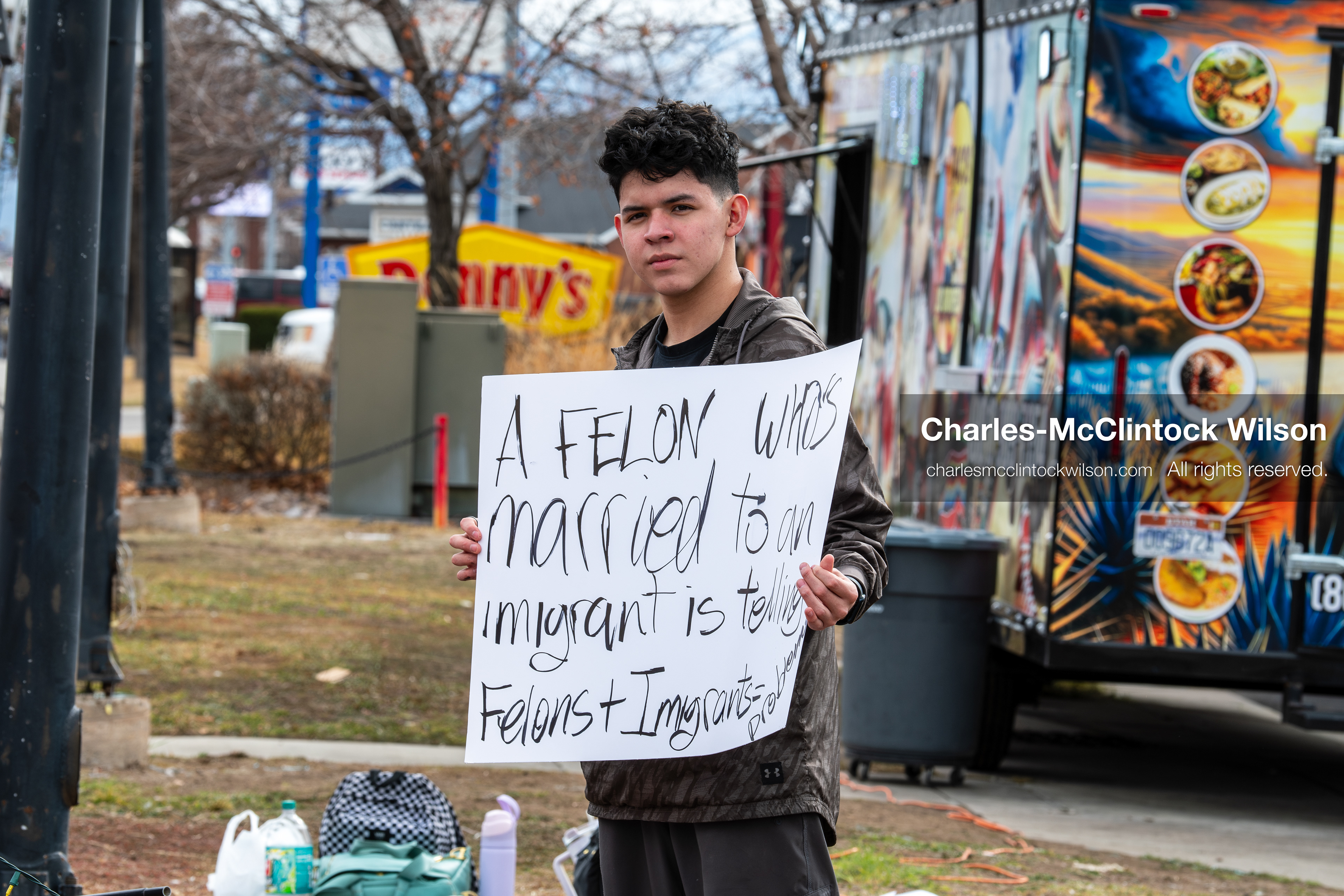 February 11, 2026, Orem, Utah, USA: A student stands along State Street during a student‑led protest involving participants from multiple Orem schools. (Credit Image: © Charles‑McClintock Wilson/ZUMA Press Wire)