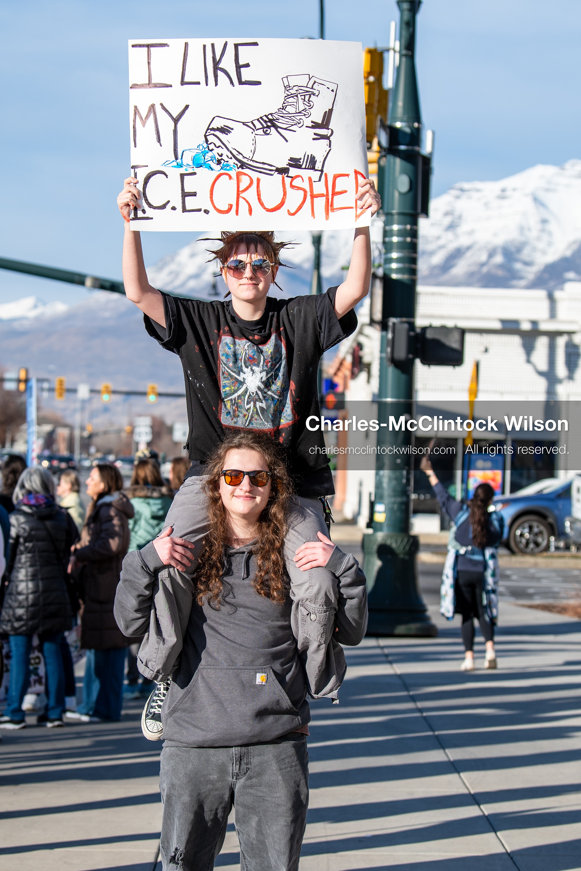 January 20, 2026, Provo, Utah, USA: A demonstrator stands outside Provo City Hall during the Free America Walkout protest in Provo Utah on January 20 2026. The nationwide event called for immigration reform and changes to detention practices. 