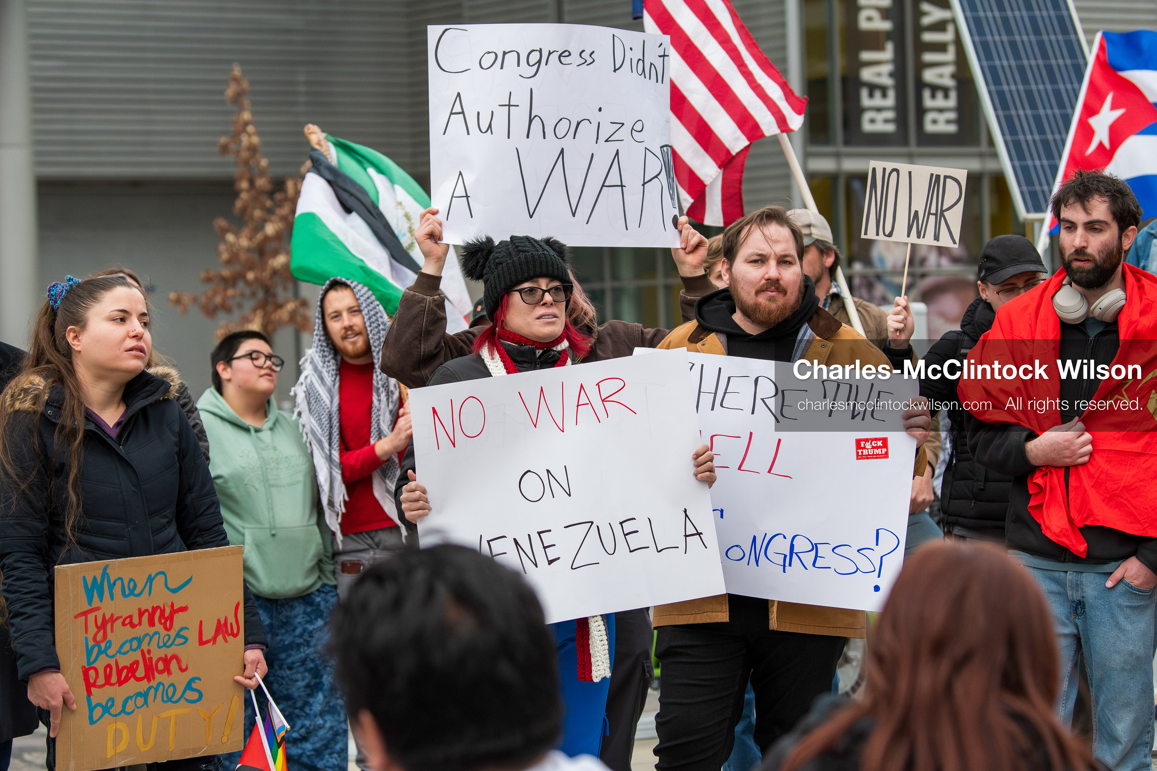 January 3, 2026, Salt Lake City, Utah, USA: Protesters hold signs during an emergency demonstration against US action in Venezuela outside the Wallace Federal Building in Salt Lake City, Utah. The event was part of a nationwide mobilization responding to recent military developments. (Credit Image: (c) Charles‑McClintock Wilson/ZUMA Press Wire)