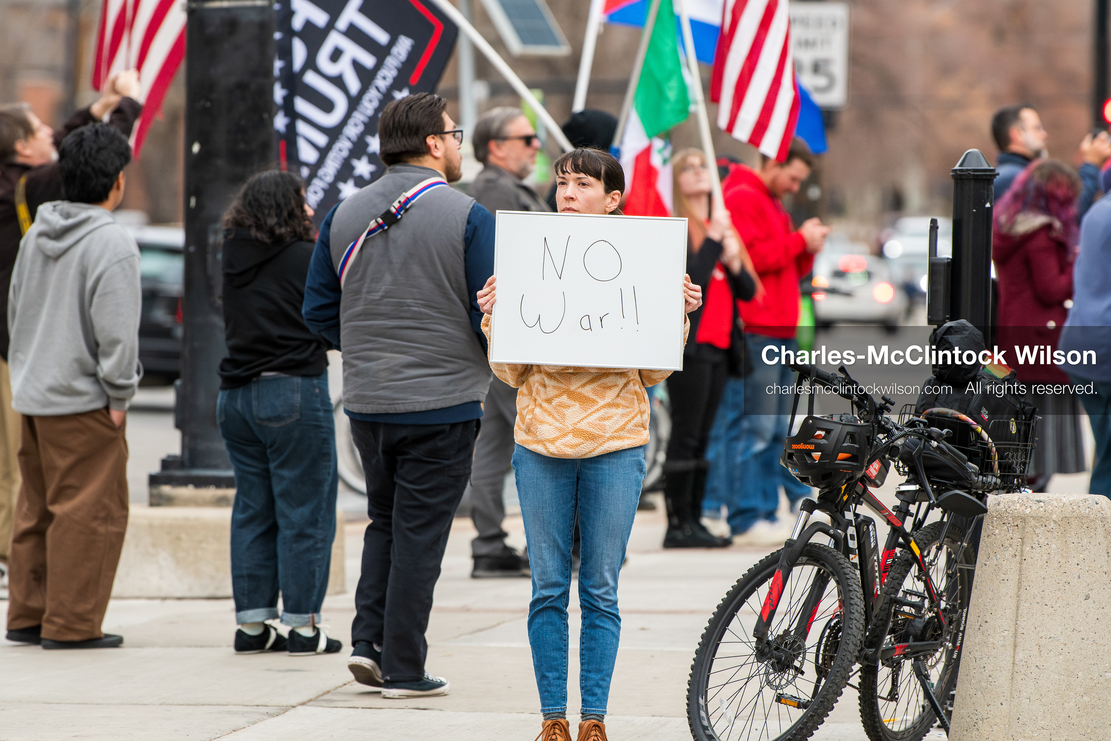 January 3, 2026, Salt Lake City, Utah, USA: A protester holds a sign during a demonstration against US action in Venezuela outside the Wallace Federal Building in Salt Lake City, Utah. The protest was part of a nationwide mobilization responding to recent military developments. (Credit Image: (c) Charles‑McClintock Wilson/ZUMA Press Wire)