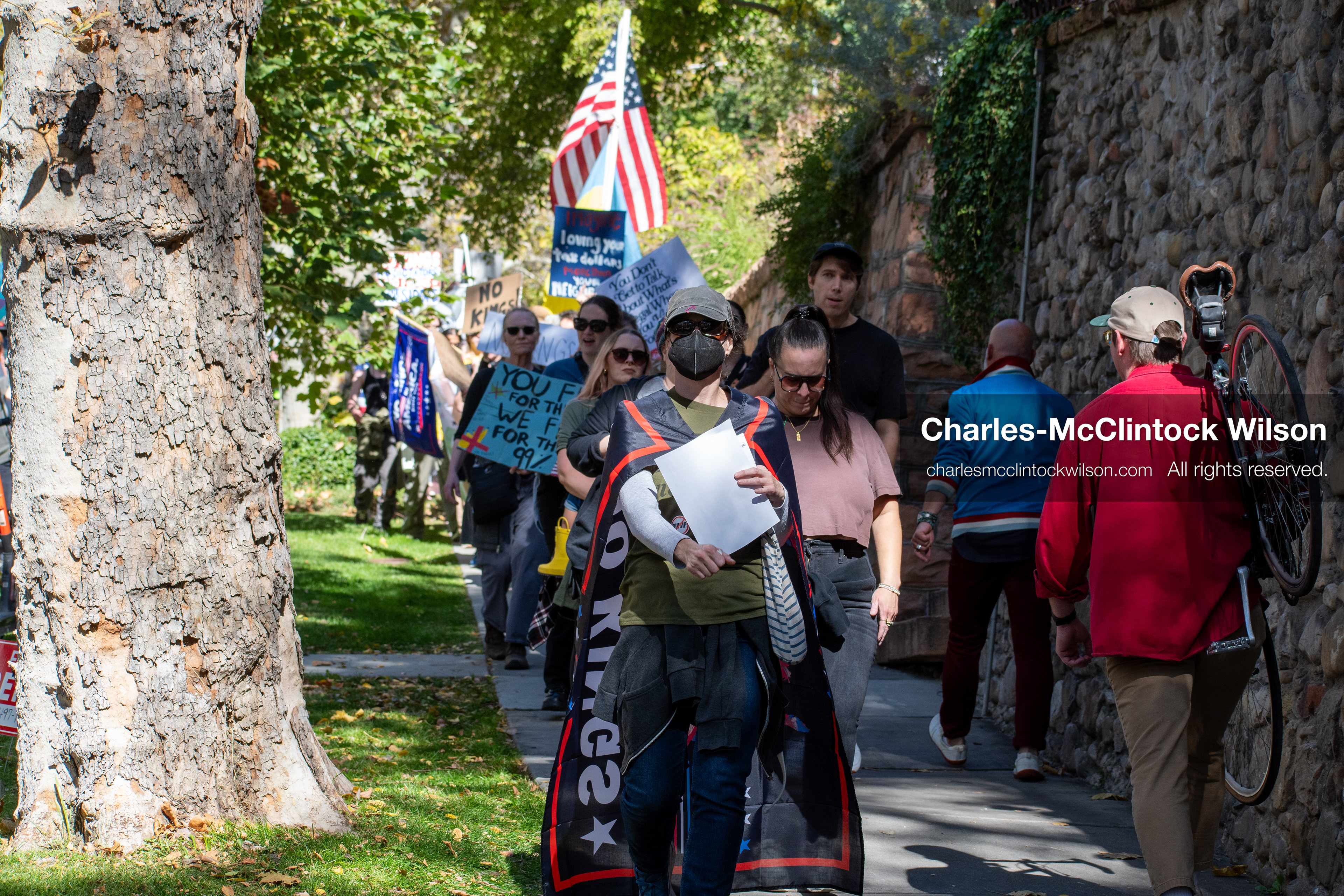October 18, 2025, Salt Lake City, Utah, USA: Demonstrators march along South State Street during a "No Kings" protest in Salt Lake City, Utah. The protest was part of a nationwide mobilization.