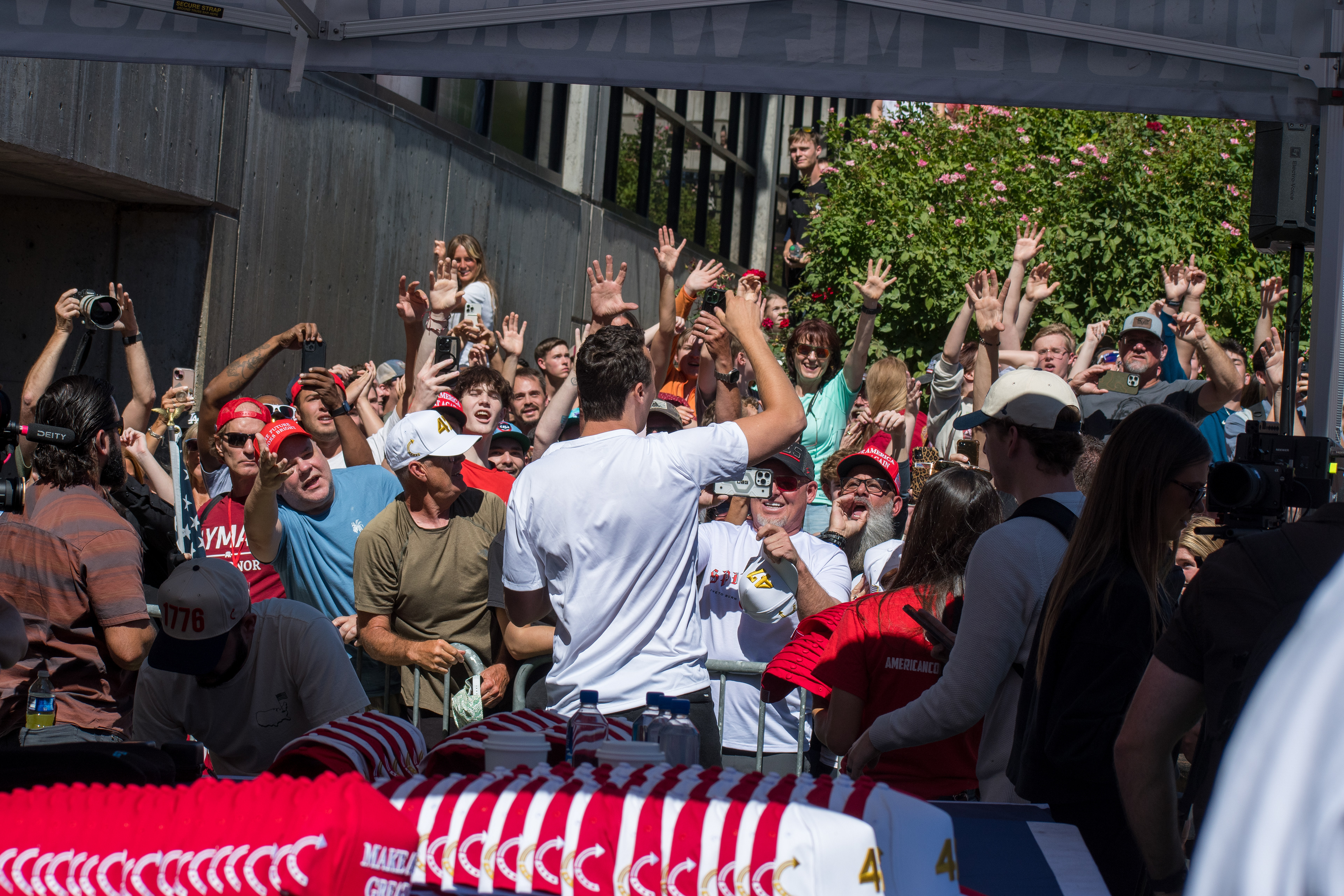 OREM, UTAH – SEPTEMBER 10, 2025: Charlie Kirk greets supporters during a public appearance at Utah Valley University. Surrounded by an energized crowd, Kirk moves through the gathering in a moment of direct engagement and civic enthusiasm. The image captures the atmosphere of connection and conviction that defined his final public appearance. © Charles-McClintock Wilson / ZUMA Press