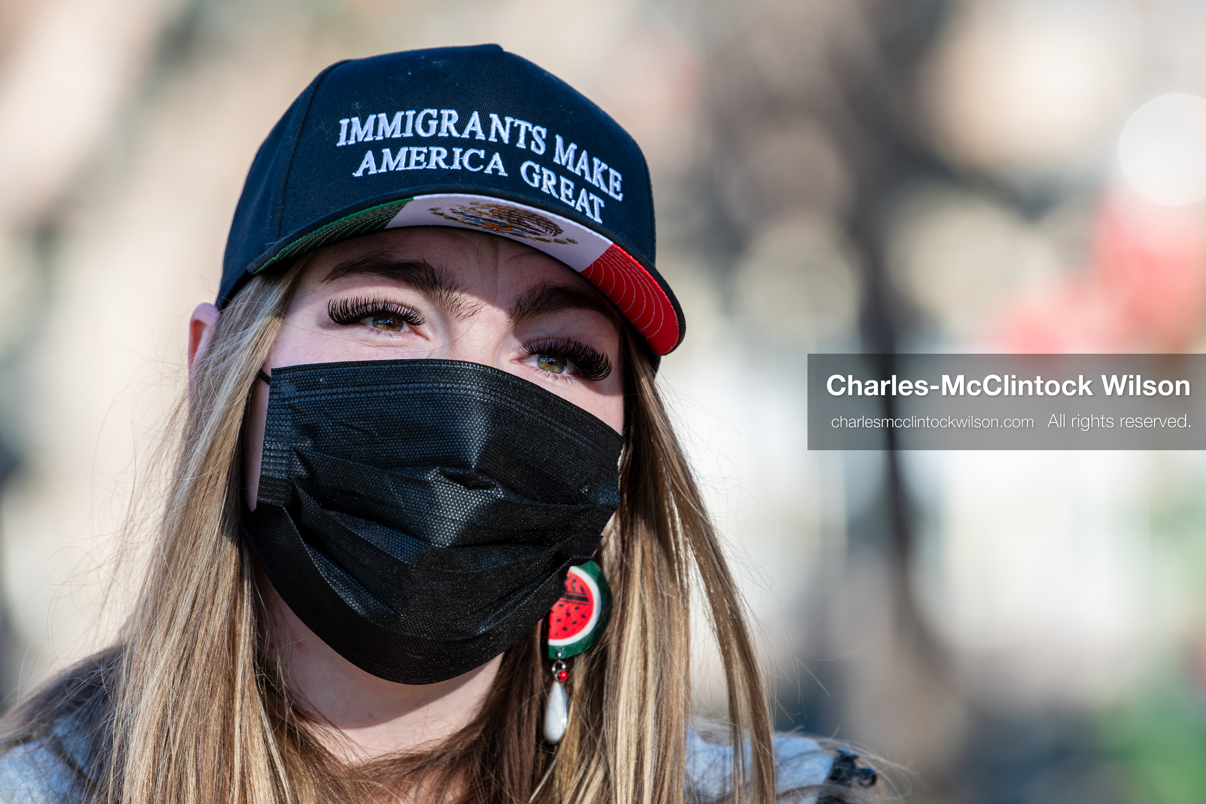 Salt Lake City, Utah, January 10, 2026: A protester wears a cap reading “IMMIGRANTS MAKE AMERICA GREAT” during the ICE Out for Good protest at Washington Square Park, a demonstration calling for justice for Renee Nicole Good. (Credit Image: © Charles‑McClintock Wilson/ZUMA Press Wire)