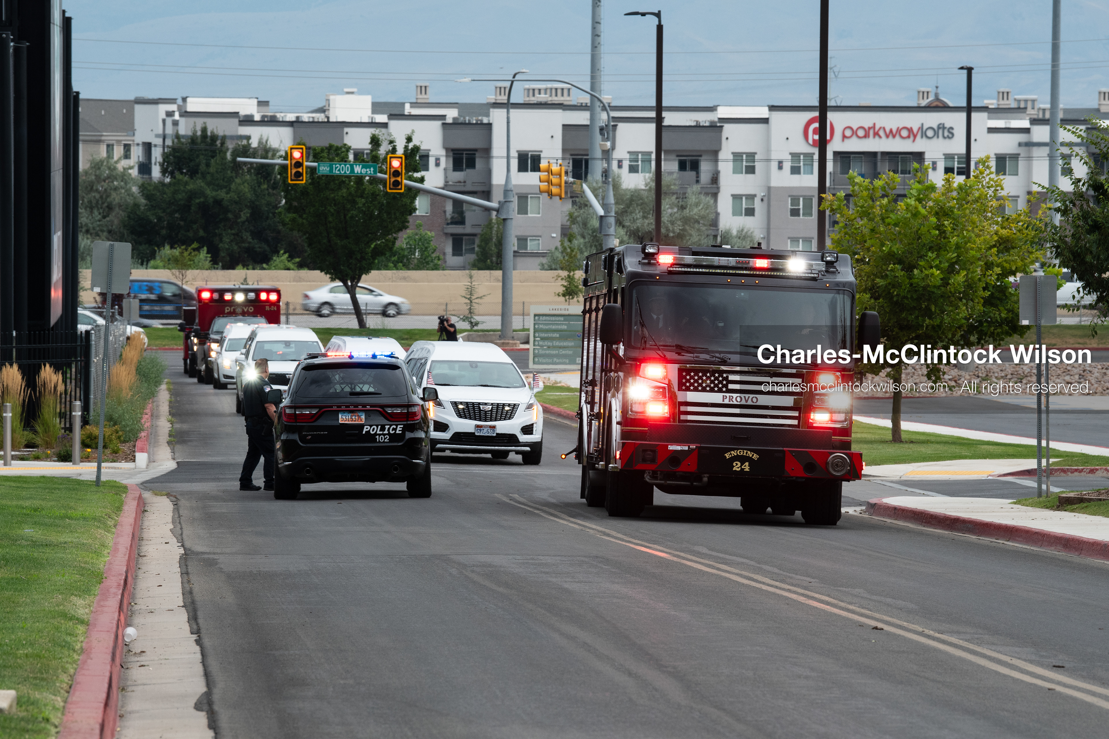 A Provo Fire Department engine and a motorcade of white hearses arrive at the UCCU Center at Utah Valley University in Orem, Utah, on Wednesday, July 29, 2026. The vehicle escort arrived ahead of a public memorial ceremony drawing community members and emergency personnel to honor five members of the Long family who died in a southern Utah flash flood. (Photo by Charles-McClintock Wilson/Sipa USA)