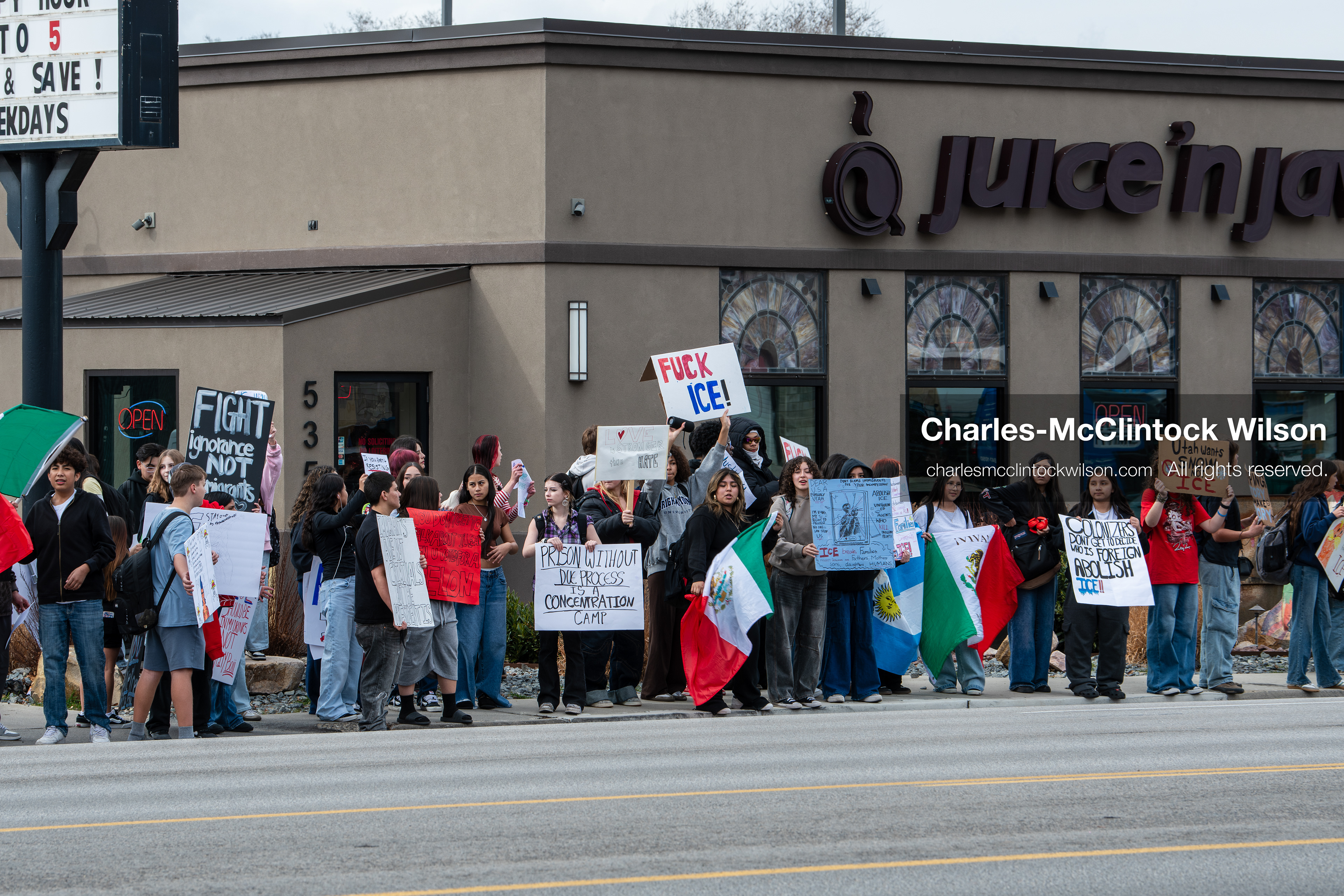 February 11, 2026, Orem, Utah, USA: Students stand on the sidewalk along State Street during a student‑led protest involving participants from multiple Orem schools. (Credit Image: © Charles‑McClintock Wilson/ZUMA Press Wire)