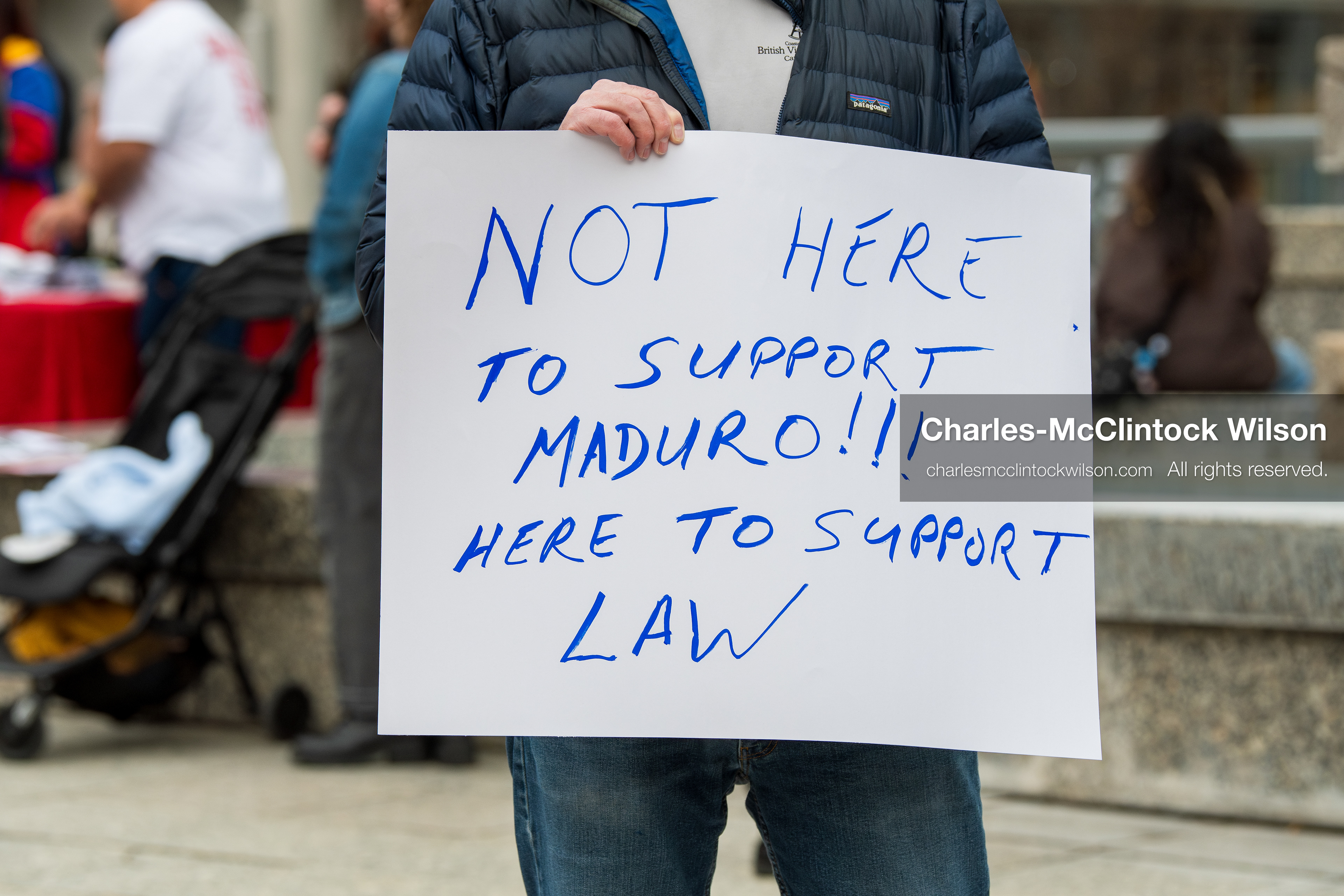 January 3, 2026, Salt Lake City, Utah, USA: A protester holds a sign during a demonstration against US action in Venezuela outside the Wallace Federal Building in Salt Lake City, Utah. The protest was part of a nationwide mobilization responding to recent military developments. (Credit Image: (c) Charles‑McClintock Wilson/ZUMA Press Wire)