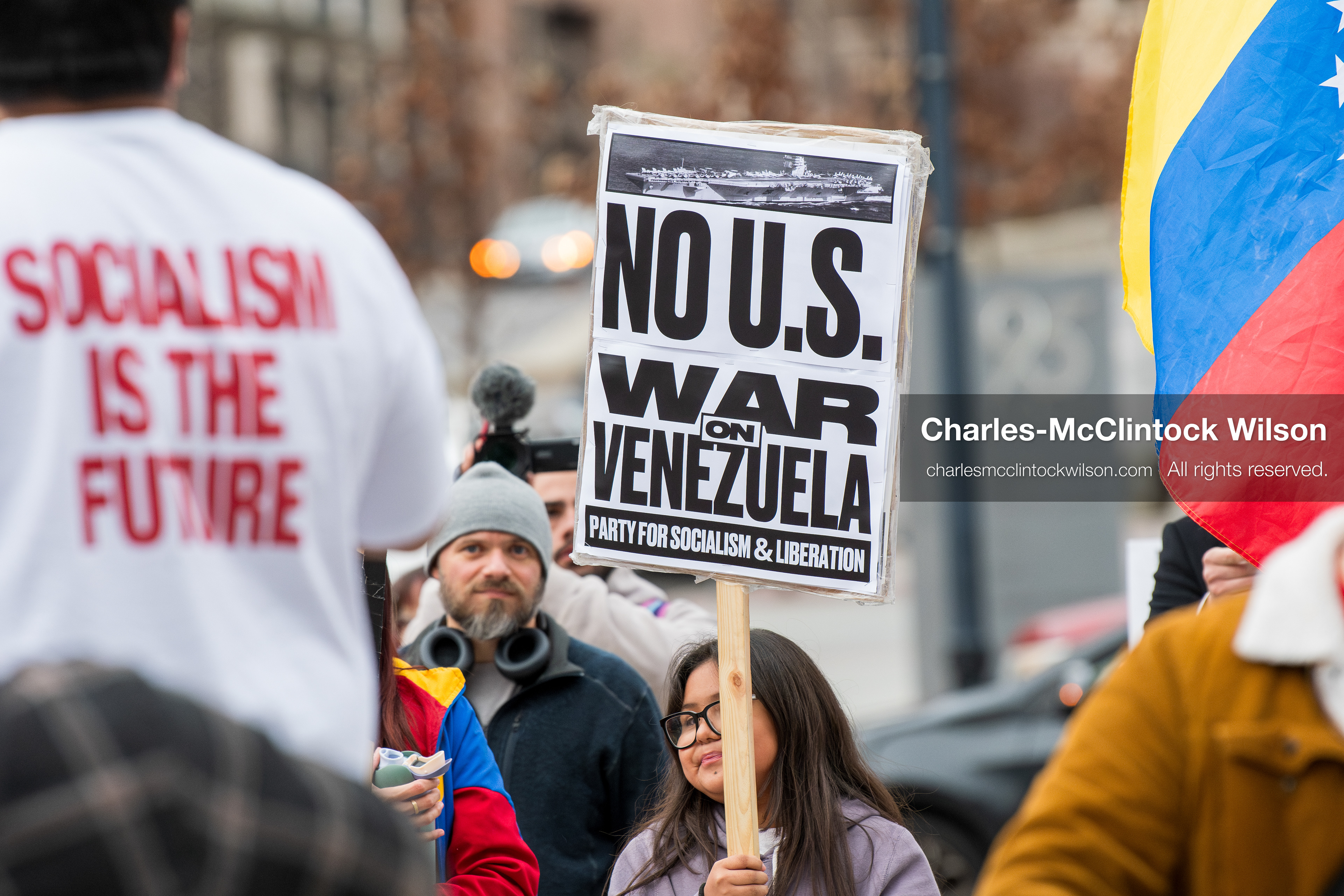 January 3, 2026, Salt Lake City, Utah, USA: A protester holds a sign during a demonstration against US action in Venezuela outside the Wallace Federal Building in Salt Lake City, Utah. The protest was part of a nationwide mobilization responding to recent military developments. (Credit Image: (c) Charles‑McClintock Wilson/ZUMA Press Wire)