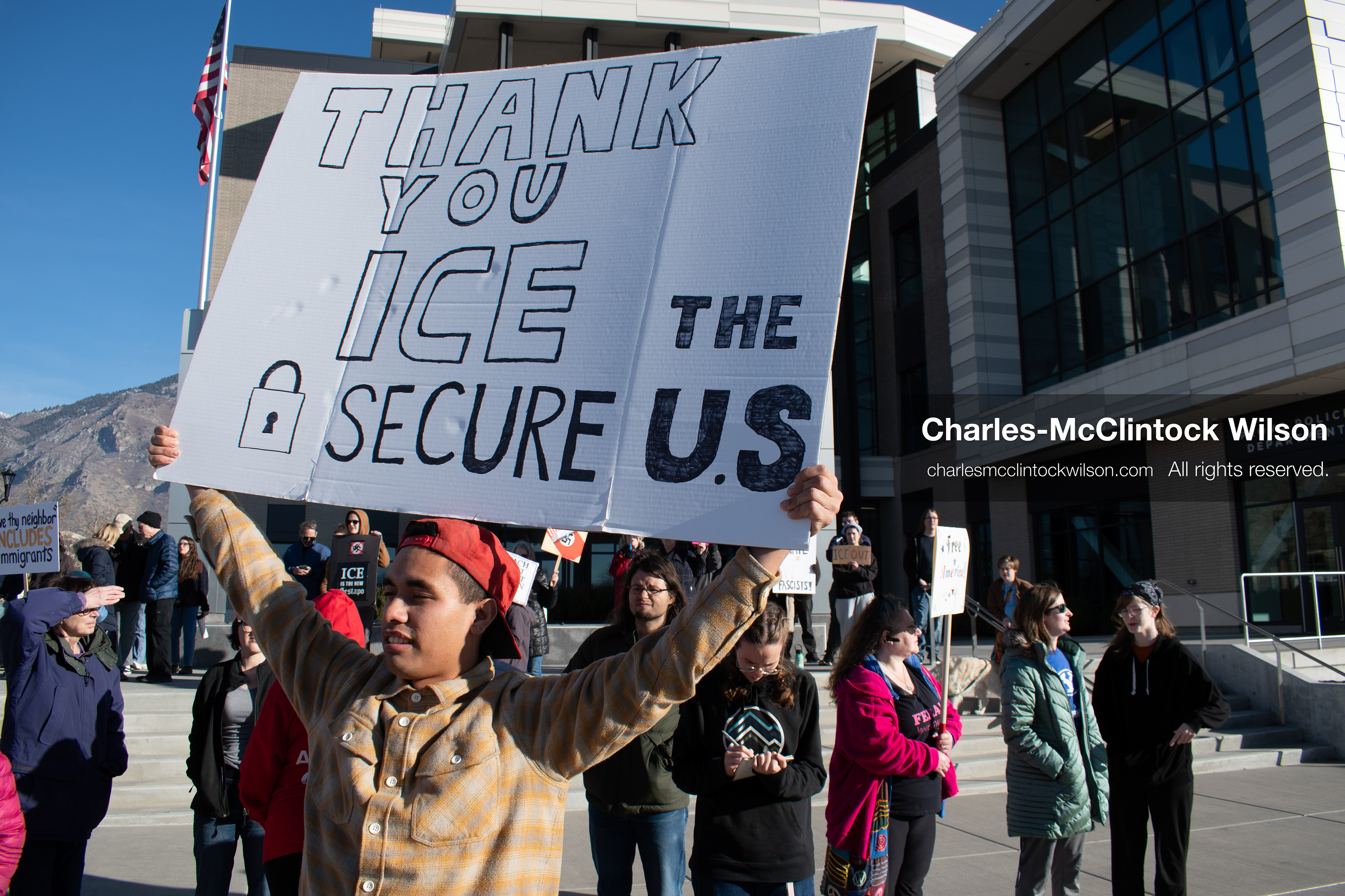 January 20, 2026, Provo, Utah, USA: A demonstrator wearing a Make America Great Again hat holds a sign supporting ICE during the Free America Walkout outside Provo City Hall in Provo Utah on January 20 2026. The individual expressed support for US president Donald Trump. The nationwide protest drew participants with varied political views. (Credit Image: © Charles-McClintock Wilson/ZUMA Press Wire)