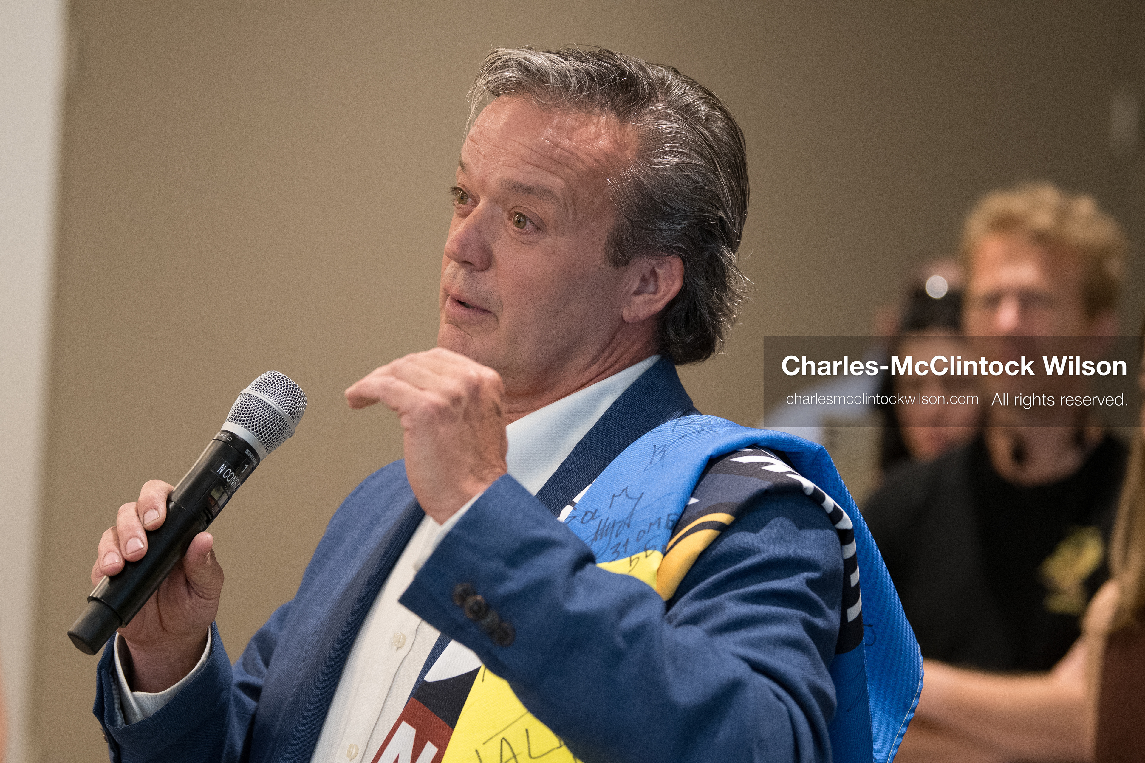 July 23, 2026, Salt Lake City, Utah, USA: An attendee speaks into a microphone while wearing a signed Ukrainian flag over his shoulders during a community meeting featuring Ukrainian activist Serhiy Prytula at the Utah State Capitol building in Salt Lake City, Utah, on Thursday, July 23, 2026. The event, titled ''Ukraine in the Fifth Year of the Full-Scale War: An Honest Conversation,'' was hosted by the Prytula Foundation USA to discuss civil defense and ongoing humanitarian aid initiatives. (Credit Image: © Charles-McClintock Wilson/ZUMA Press Wire)