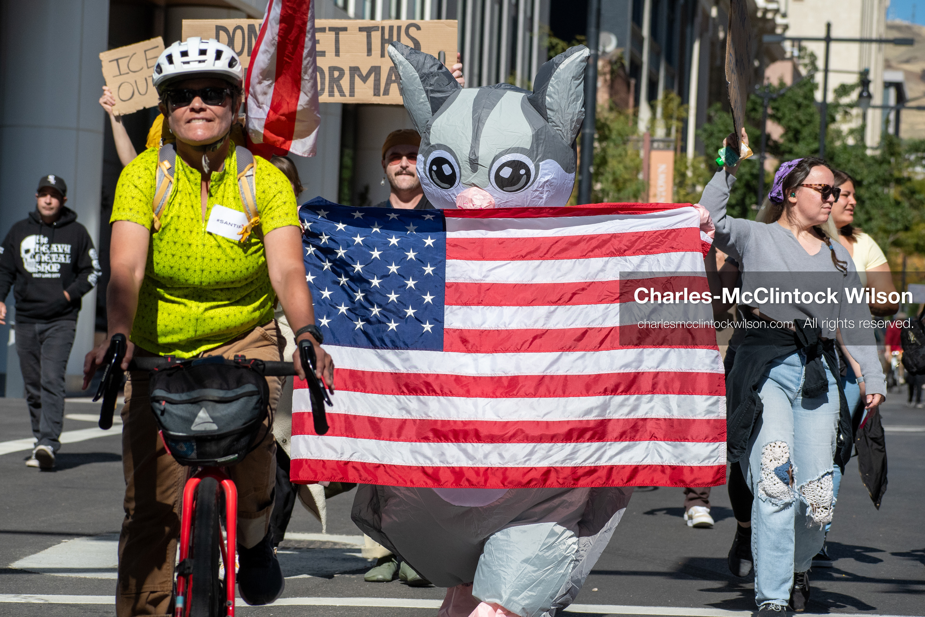 October 18, 2025, Salt Lake City, Utah, USA: Demonstrators march along South State Street during a "No Kings" protest in Salt Lake City, Utah. The protest was part of a nationwide mobilization.