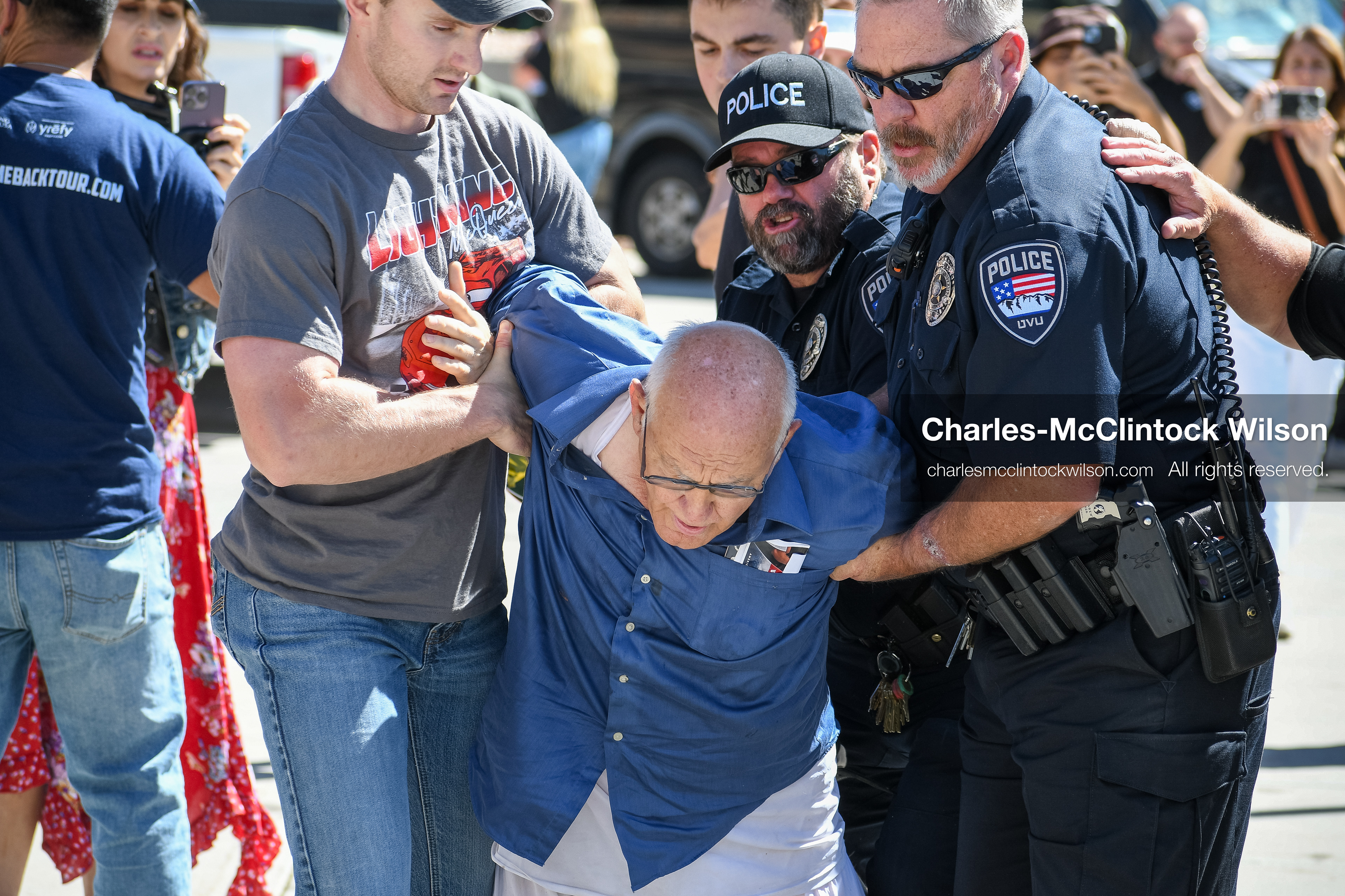 September 10, 2025, Orem, Utah, USA: George Zinn is taken into custody by campus security following the fatal shooting of Charlie Kirk during a public event at Utah Valley University. At the time of the arrest, Zinn was identified as the alleged shooter. He was later released and subsequently arrested on unrelated charges. Law enforcement confirmed that the actual suspect remained at large during this initial response. (Credit Image: © Charles-McClintock Wilson/ZUMA Press Wire)