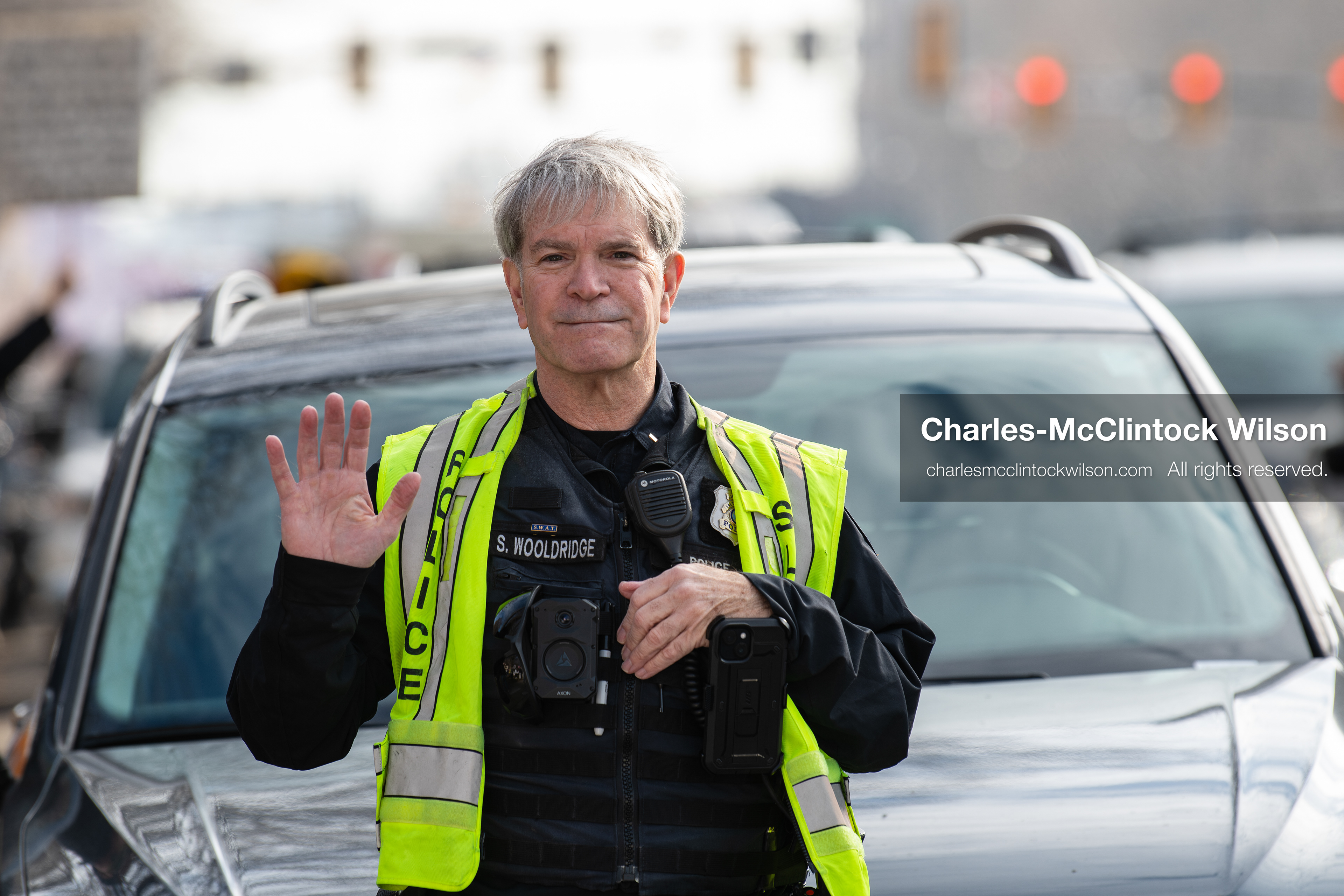 January 30, 2026, Salt Lake City, Utah, USA: A Salt Lake City police officer waves while monitoring the scene during an anti‑ICE protest, part of a nationwide response to immigration enforcement policies. (Credit Image: © Charles‑McClintock Wilson/ZUMA Press Wire)