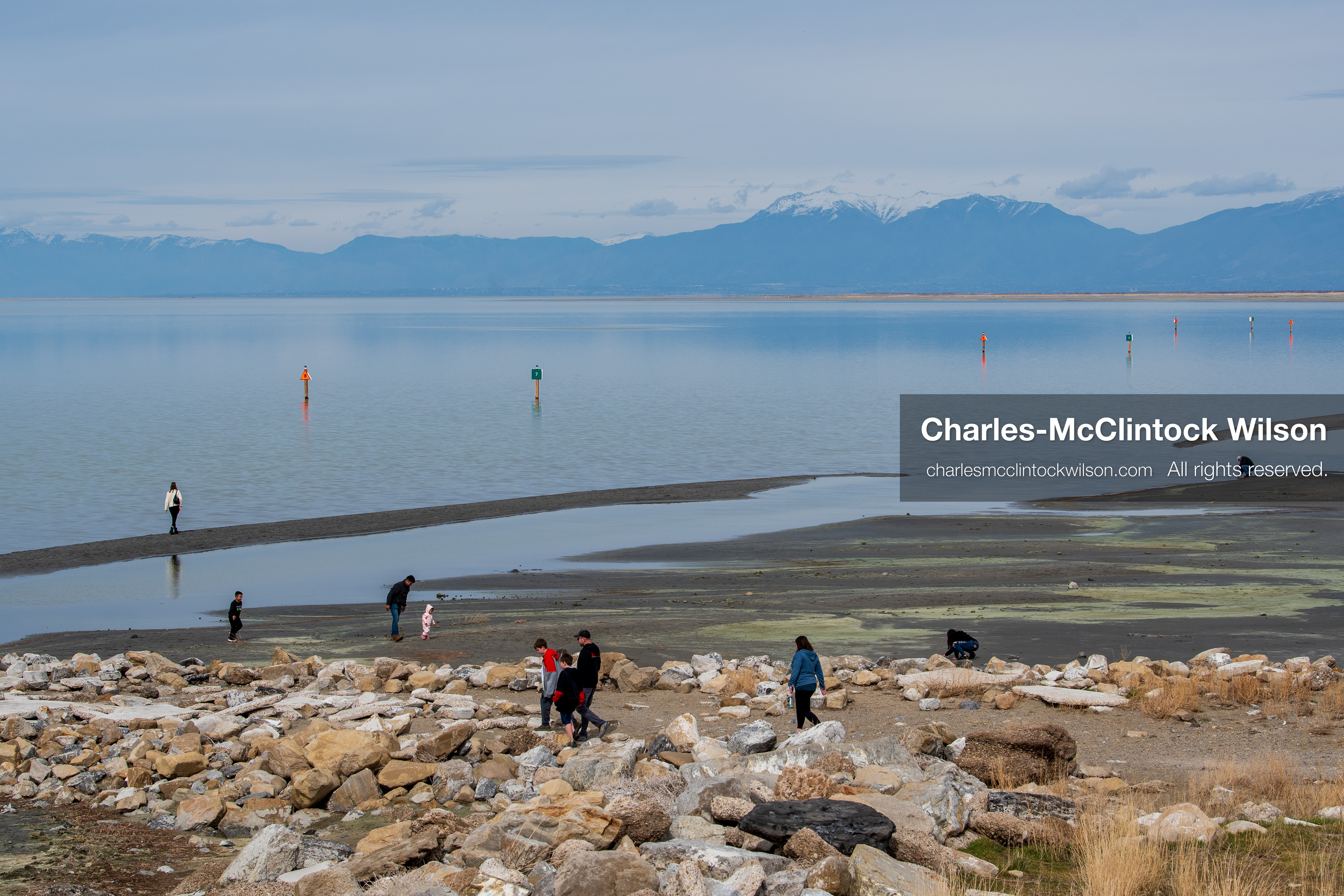 March 1, 2026, Great Salt Lake, Utah, USA: People walk along the shoreline of the Great Salt Lake as water levels remain historically low. Reports from state officials and the Great Salt Lake Strike Team state that the lake continues to fall within a serious adverse‑effects range, with elevations among the lowest recorded in more than one hundred years. The lake has drawn increased public attention as lawmakers consider large‑scale water projects and long‑term plans to address declining conditions. (Credit Image: © Charles‑McClintock Wilson/ZUMA Press Wire)