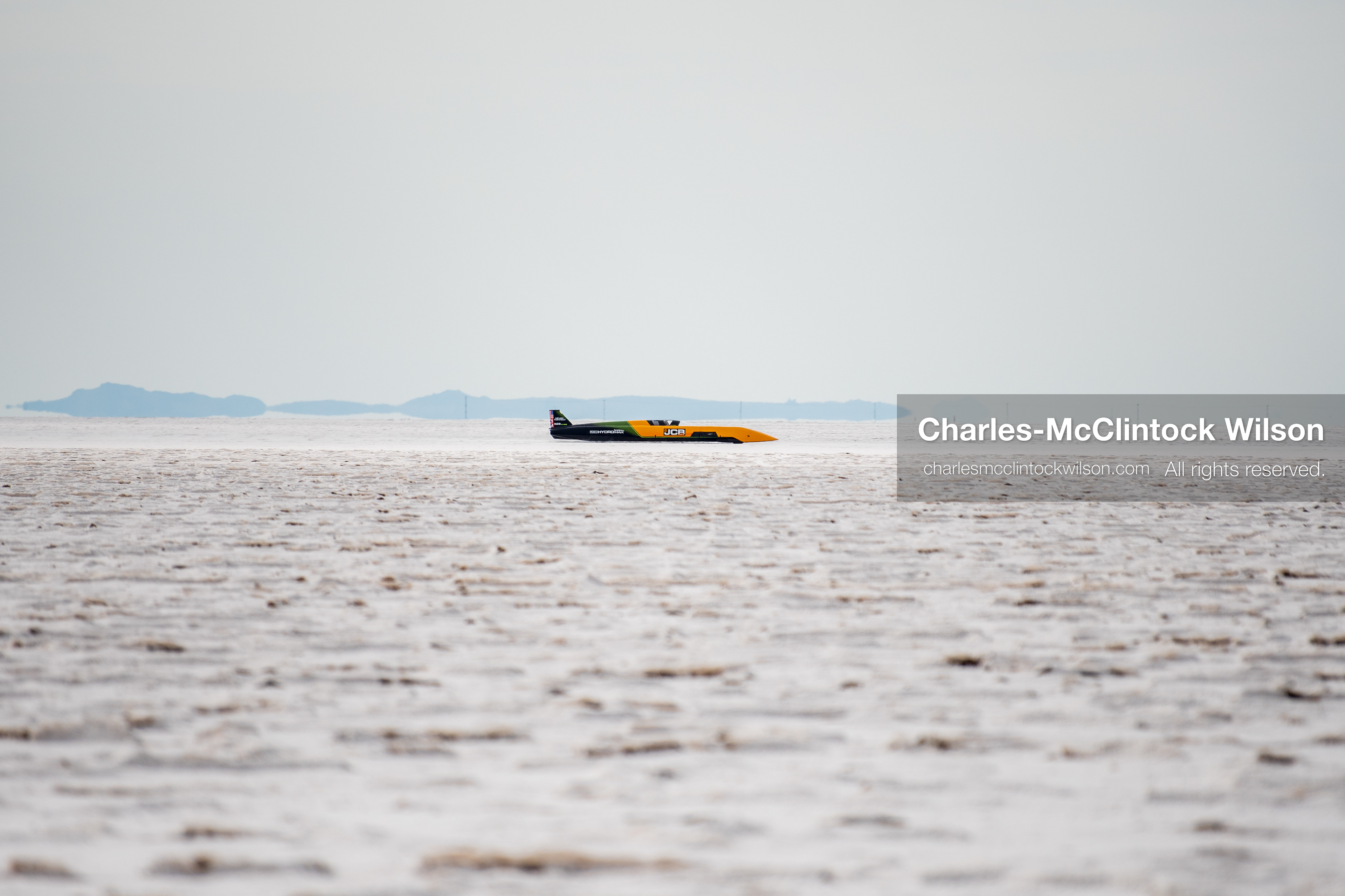 August 11, 2026, Wendover, Utah, USA: British driver Andy Green pilots the JCB Hydromax hydrogen‑powered streamliner across the Bonneville Salt Flats near Wendover, Utah, during high‑speed test runs ahead of a land‑speed record attempt. The retired Royal Air Force pilot, who previously set world records with ThrustSSC, is targeting new benchmarks for hydrogen propulsion under FIA observation. (Credit Image: © Charles‑McClintock Wilson / ZUMA Press Wire)