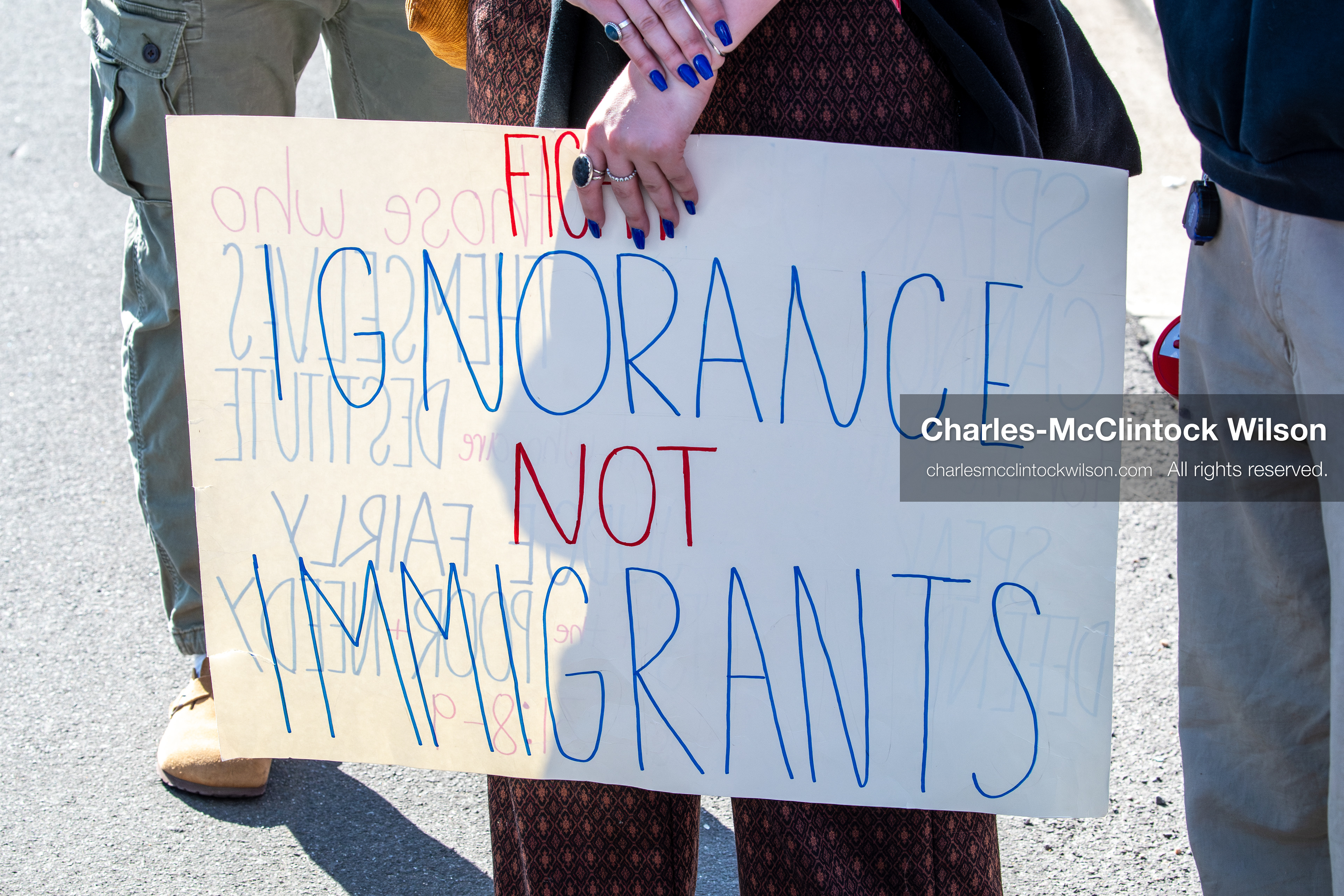 February 5, 2026, Provo, Utah, USA: A demonstrator holds a sign during a gathering near Brigham Young University in Provo where students and community members protested the presence of US Customs and Border Protection recruiters at a career fair held on the BYU campus. (Credit Image: © Charles McClintock Wilson/ZUMA Press Wire)