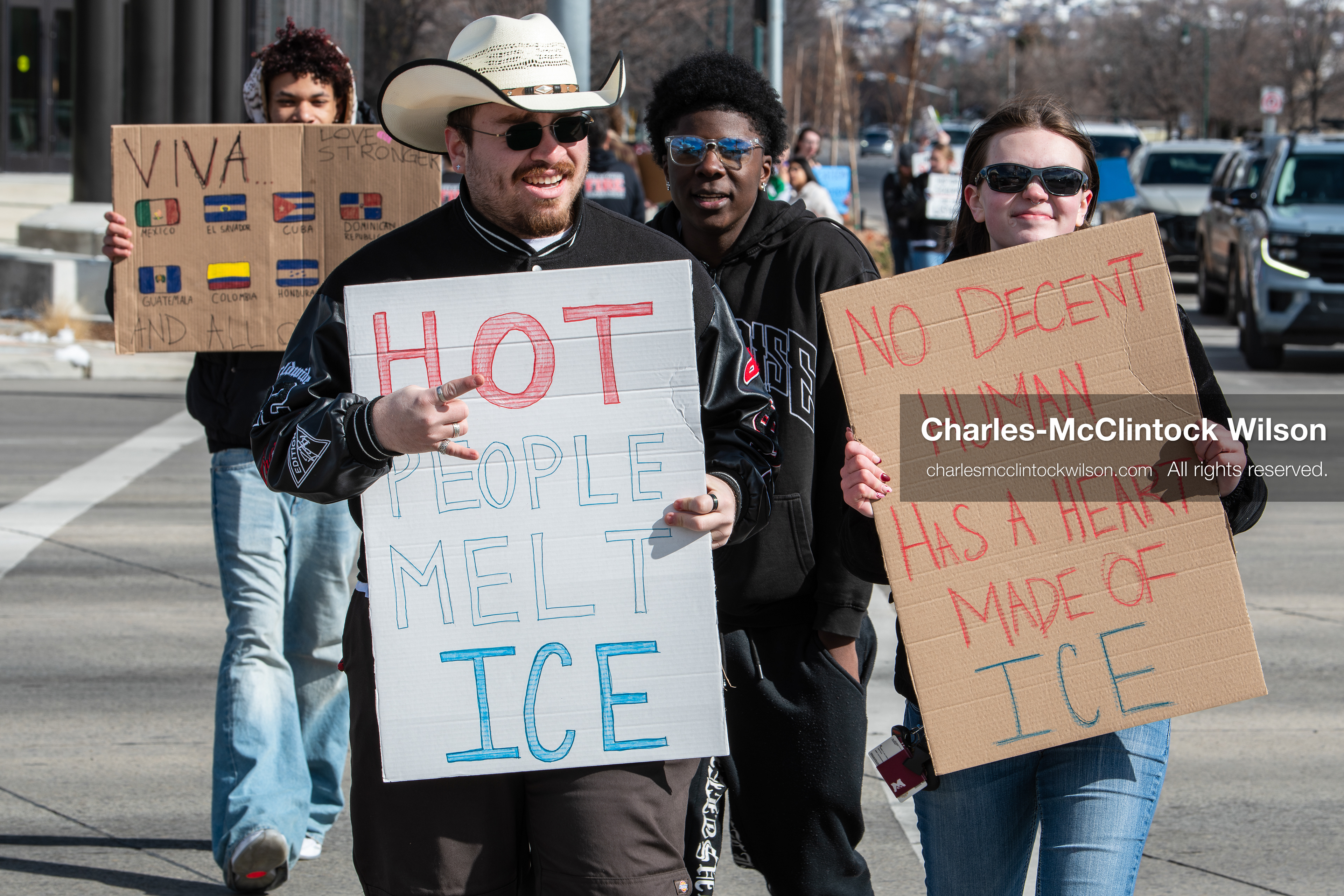 February 20, 2026, Orem, Utah, USA: Participants cross State Street in front of Orem City Hall during a student led protest against ICE. Demonstrators move through the crosswalk as vehicles wait in the area. (Credit Image: © Charles McClintock Wilson/ZUMA Press Wire)
